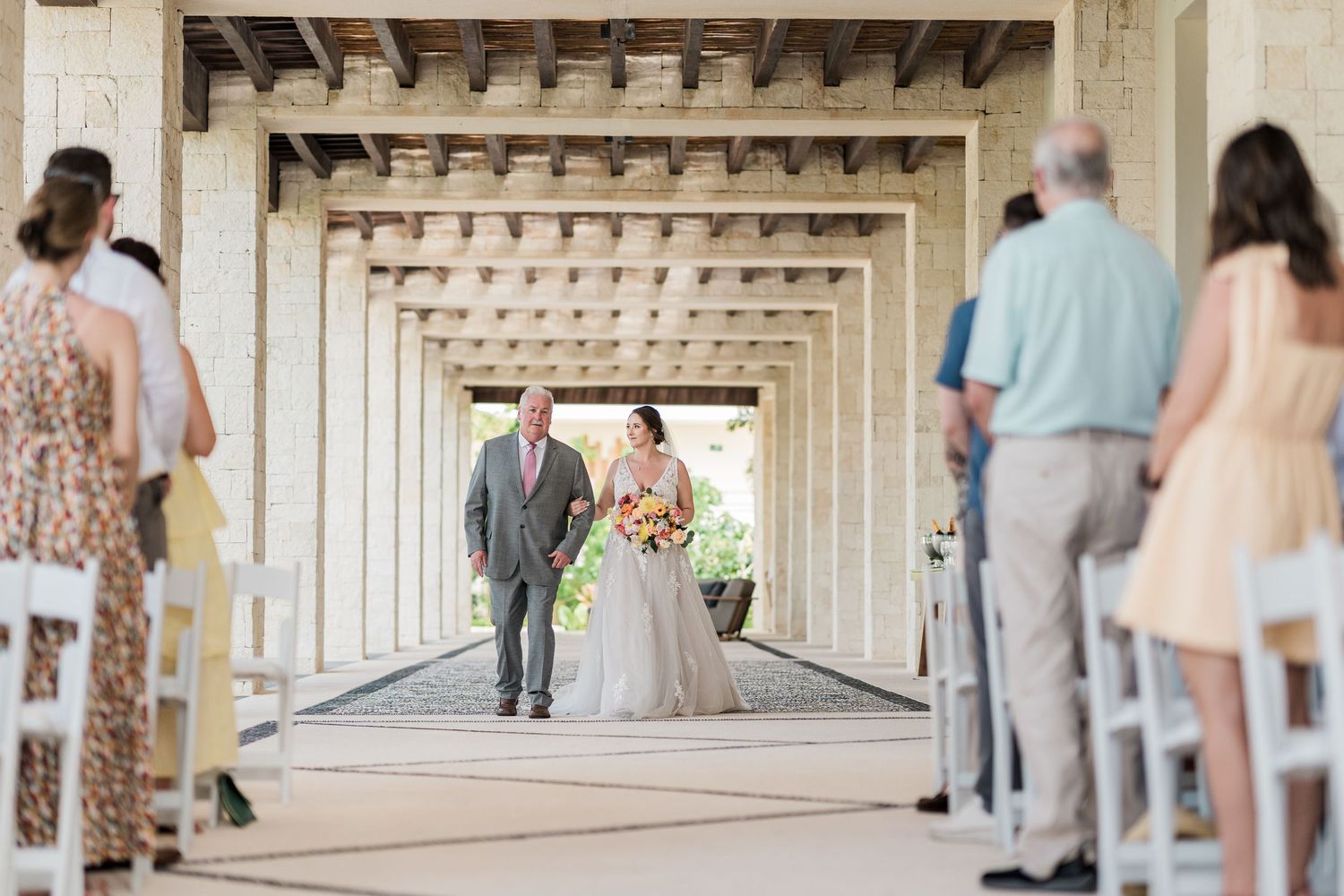 riviera Maya wedding photographer bride walking with dad to the aisle