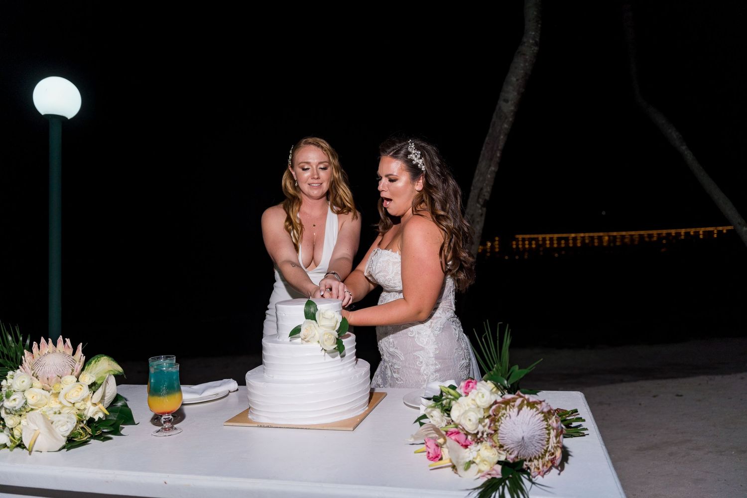 Barceló Maya Palace wedding reception cake cutting