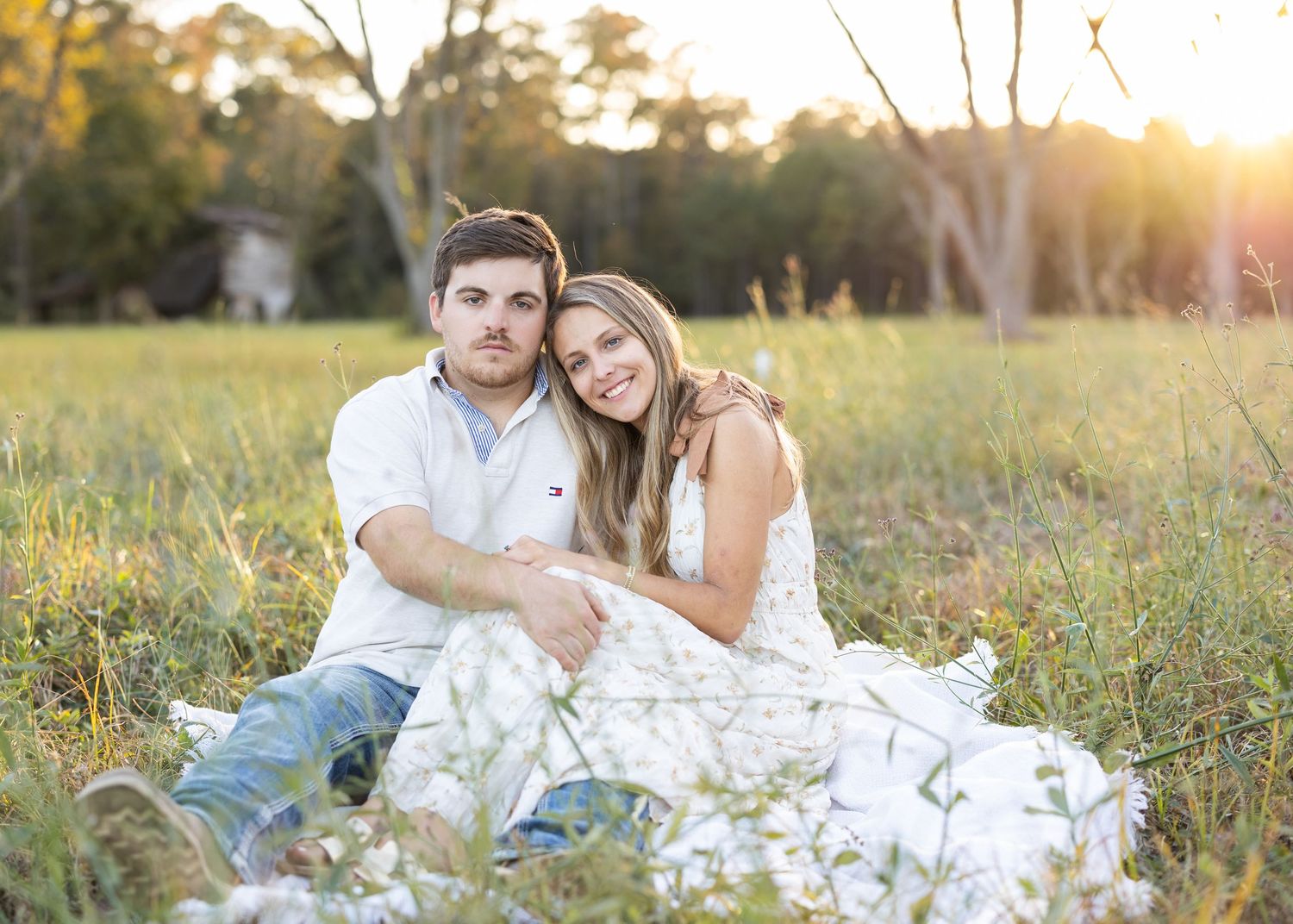 Farm country portrait session of Riley and Will at golden hour in Pender County, NC