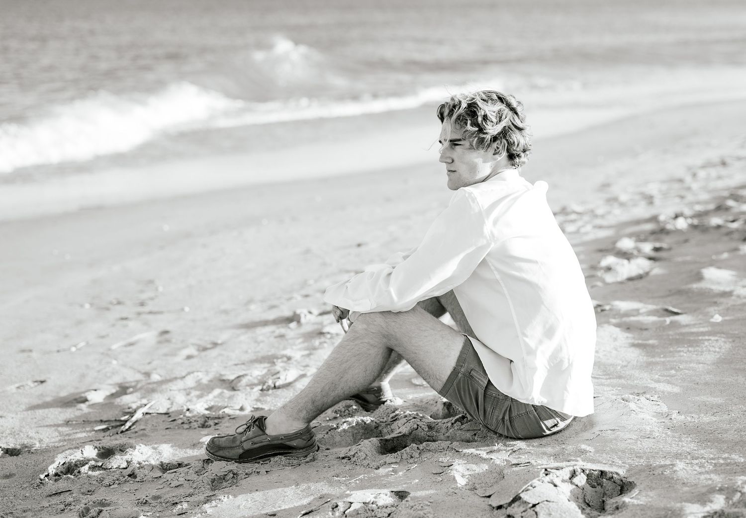 Casual beach photograph of young man at Wrightsville Beach NC