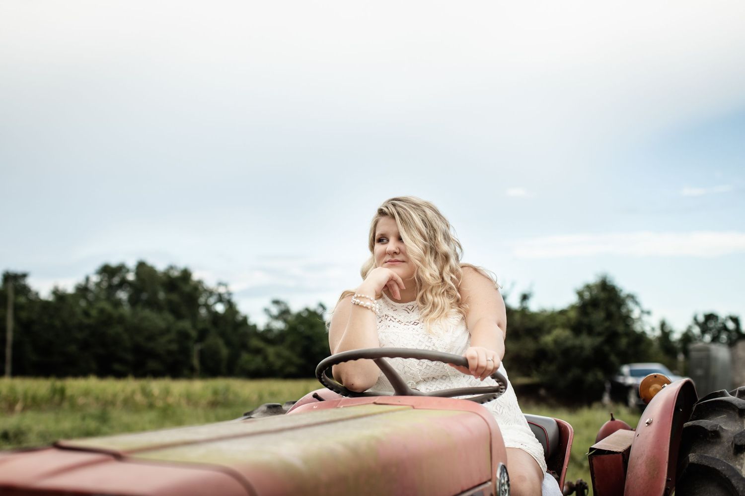 Photos of girl on tractor on farm in Delco NC