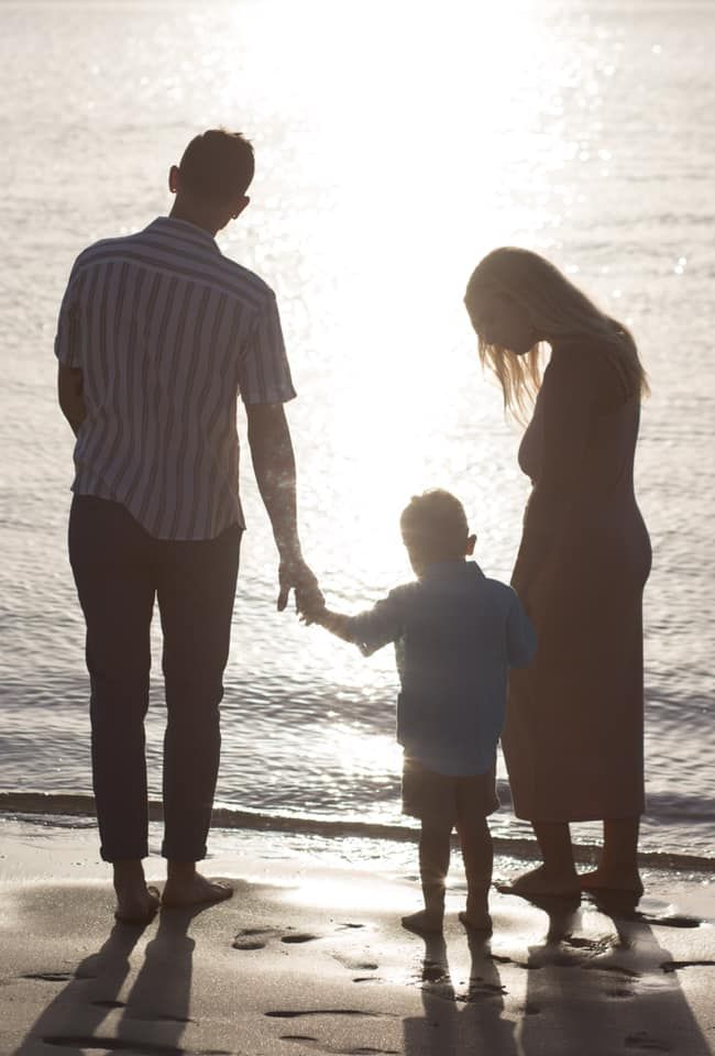 Silhouette photograph of family at the beach Wilmington, NC