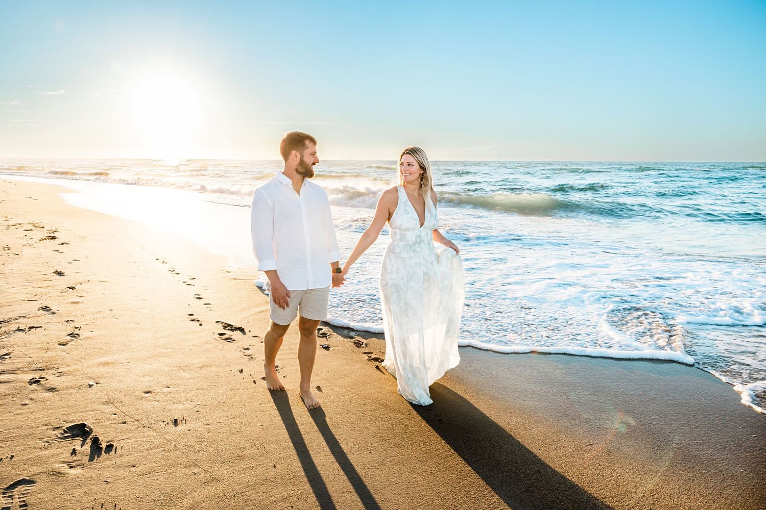 Couple sunrise beach session Wrightsville Beach NC