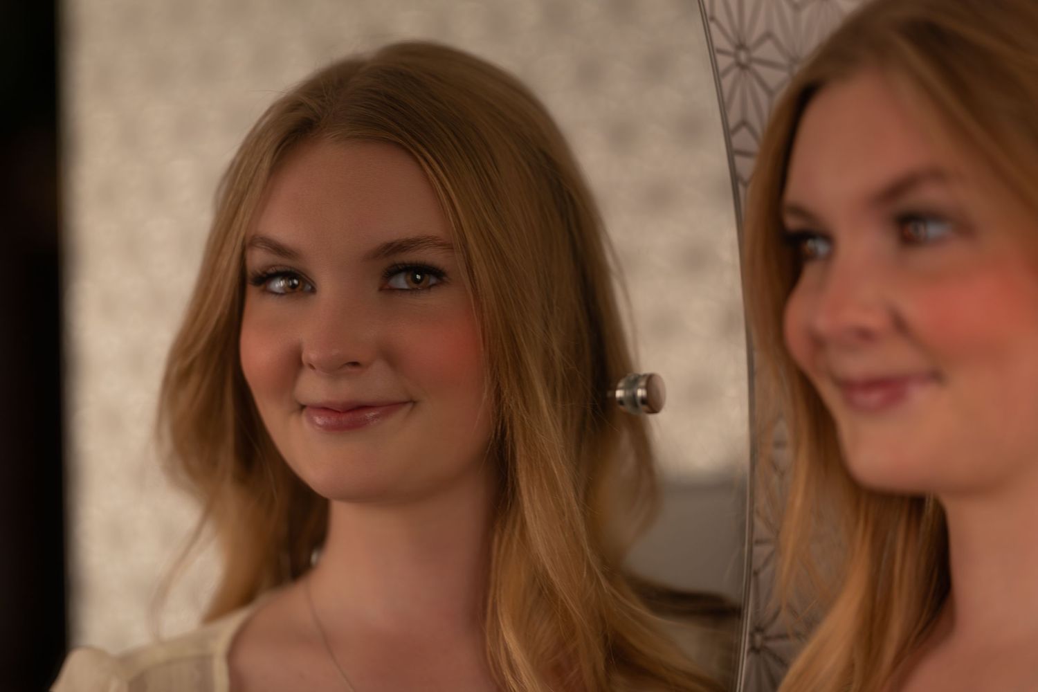 A collage of portrait photos showing someone with blonde hair making various playful facial expressions and poses.