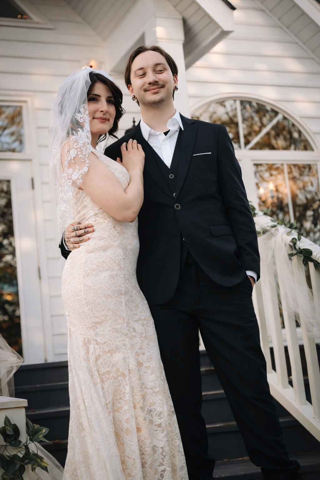 A bride and groom share intimate moments on a white gazebo porch in a series of romantic wedding photos.