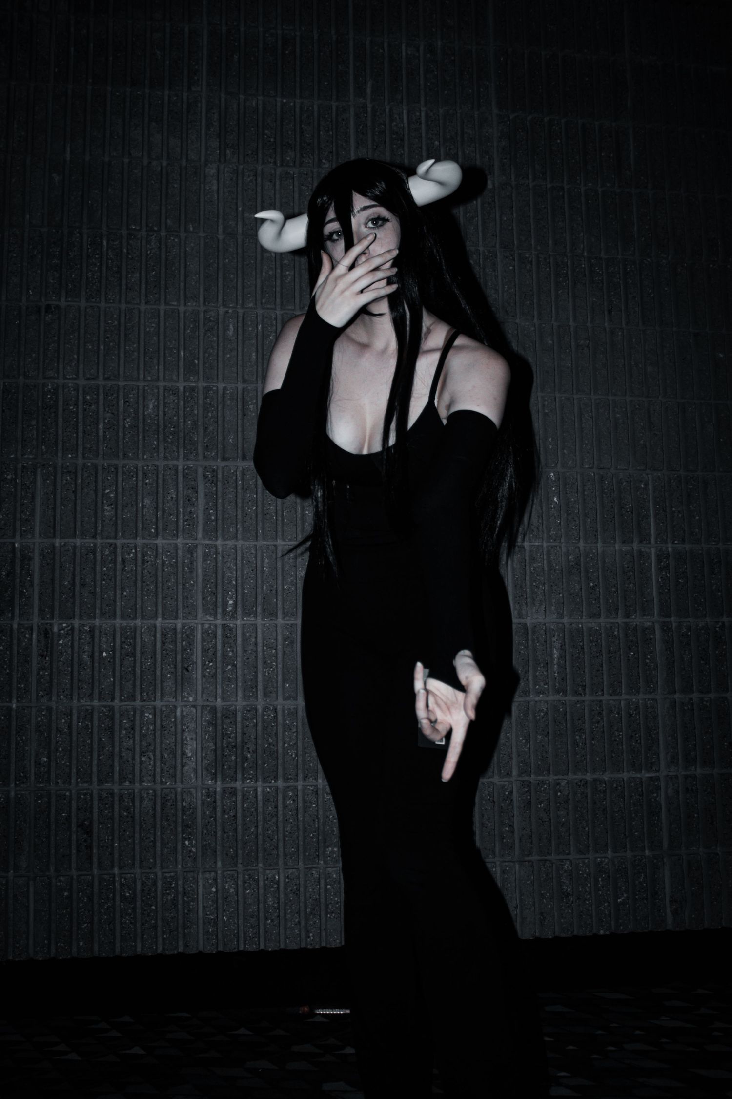 Dark artistic portraits showing expressive poses in gothic style clothing.