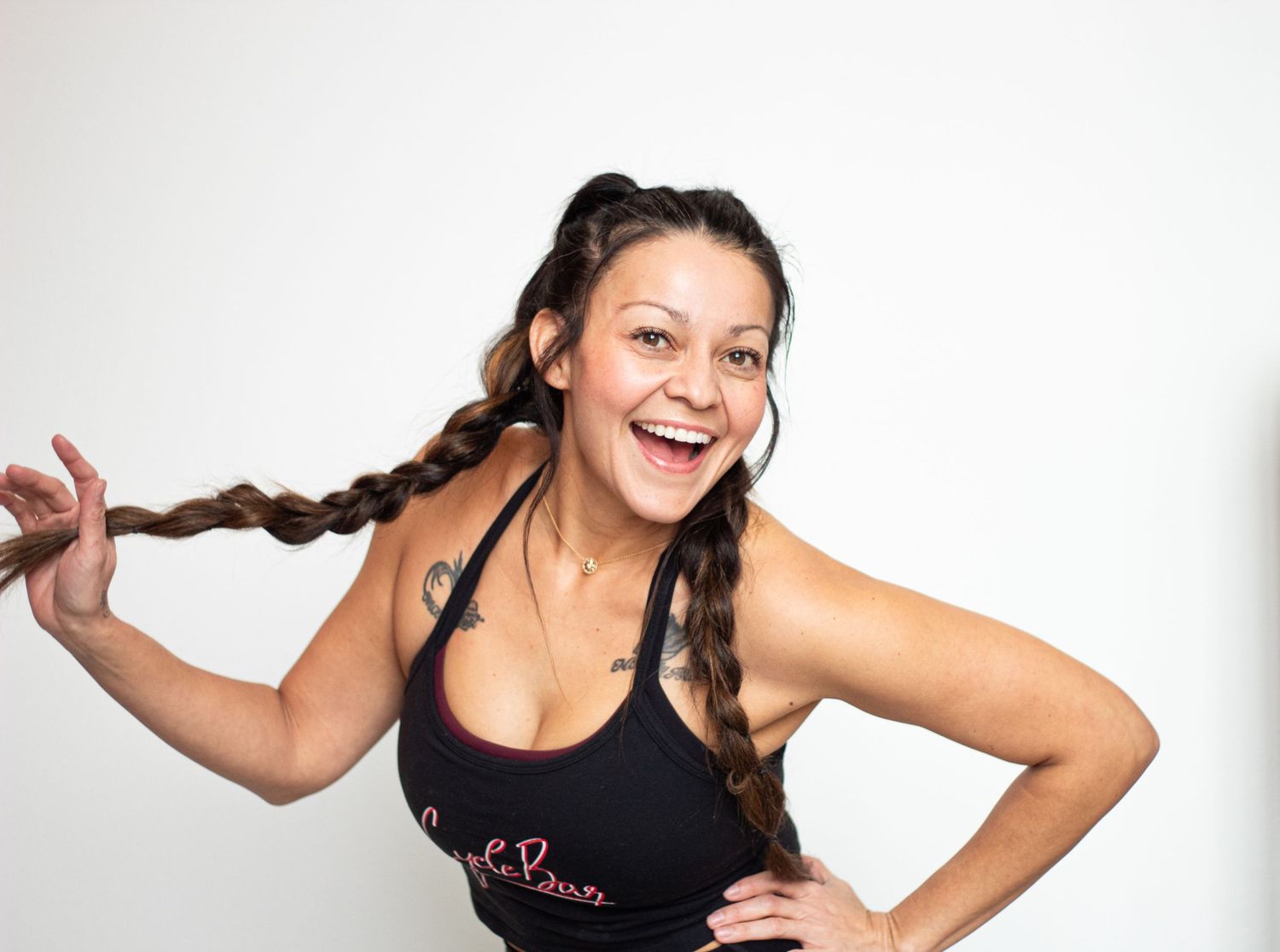 Tasha Rickard poses playfully at Cyclebar DTC