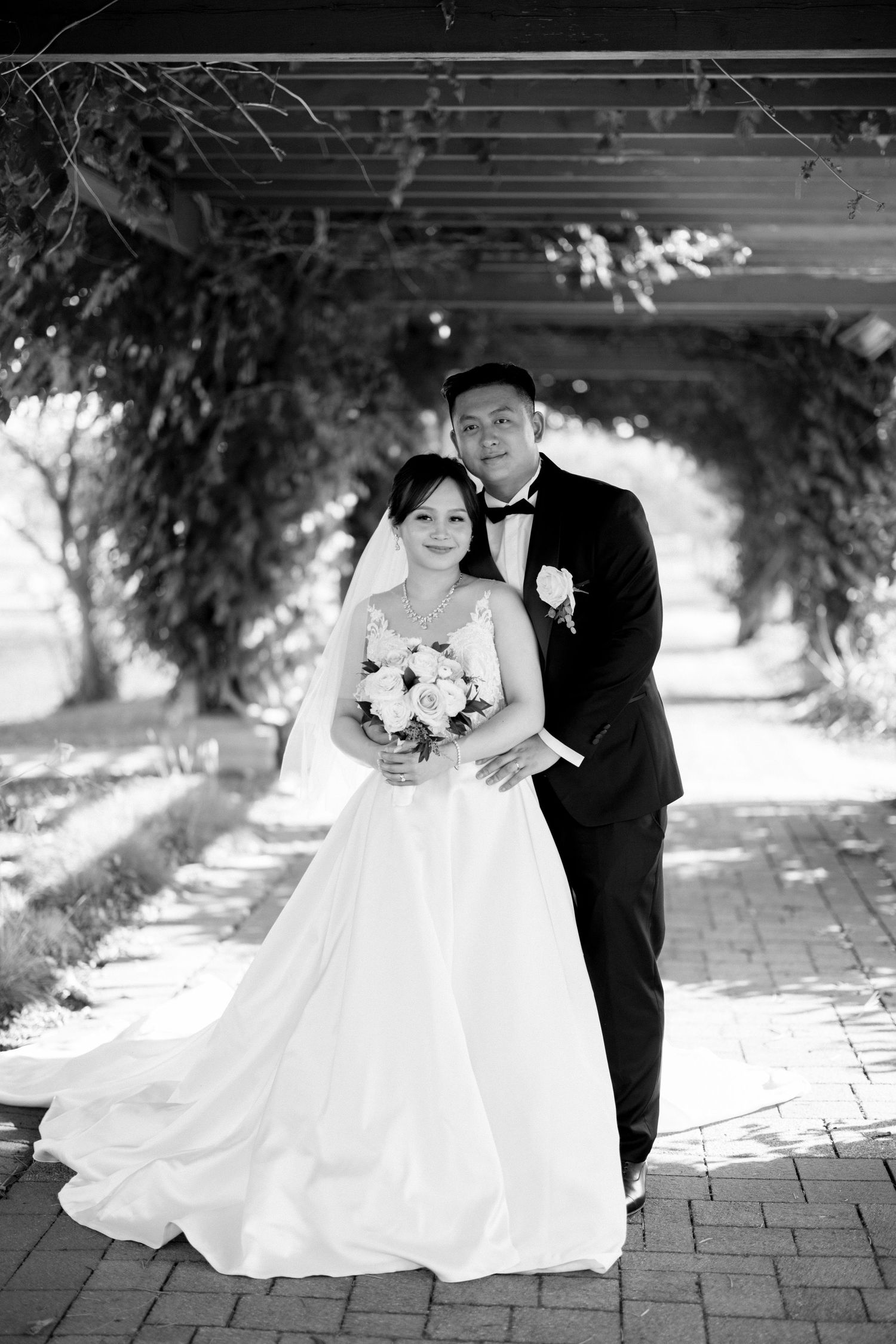 Bride and groom walking hand-in-hand – Toronto wedding photography