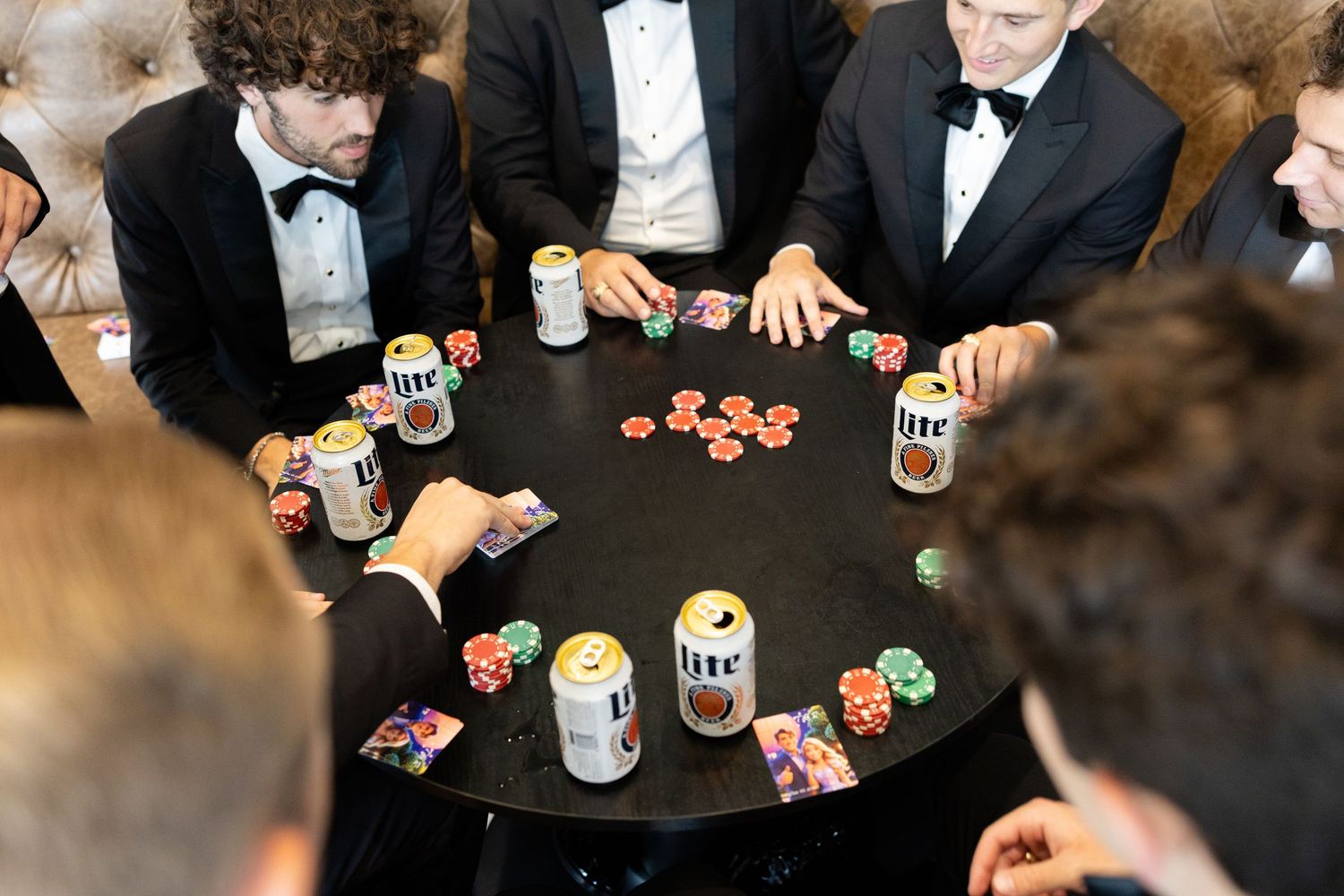 playing poker in the groomsmen suite at The Hillside Estate Wedding Venue