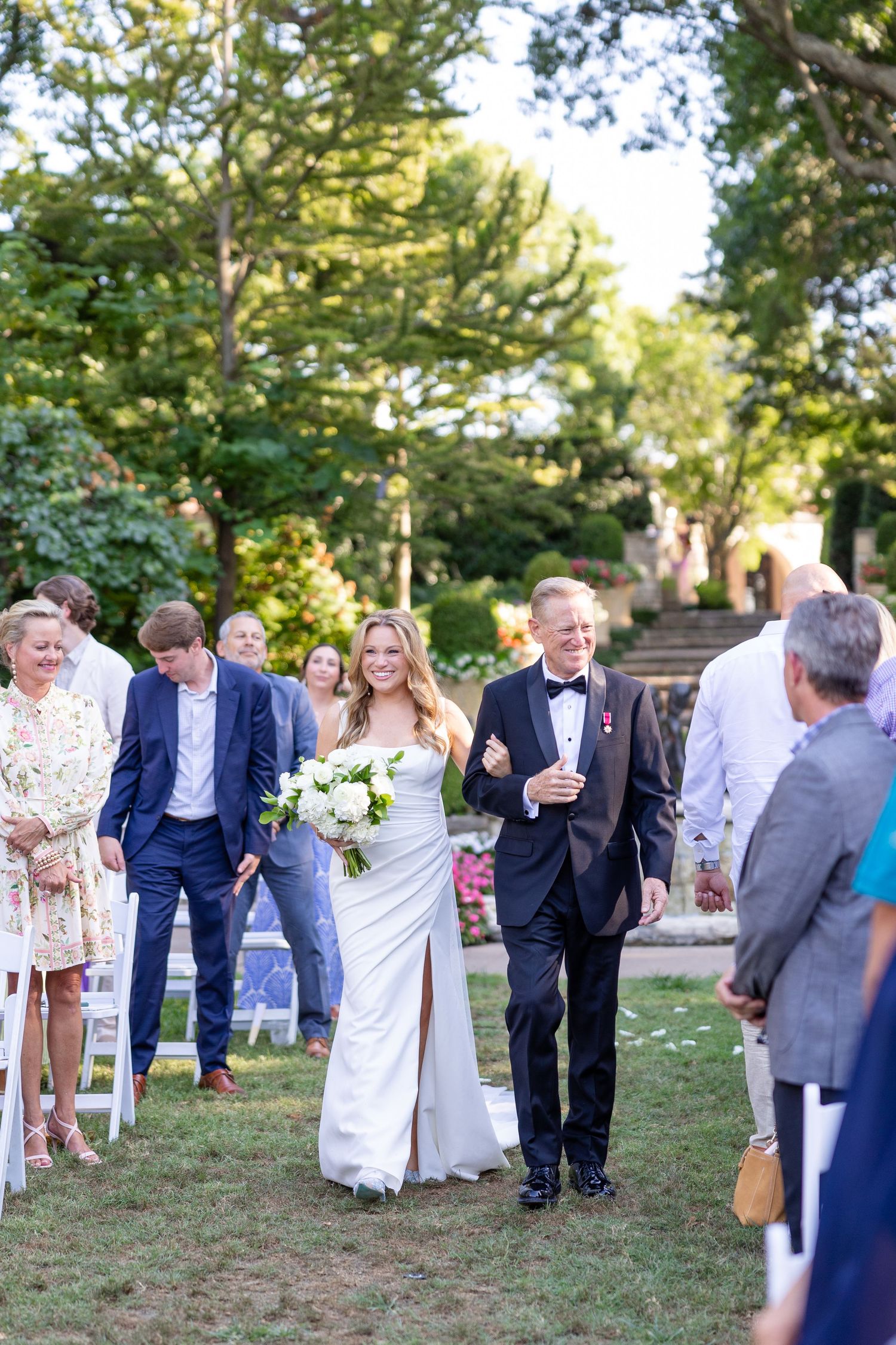 Bride walking down the aisle at Dallas Arboretum Wedding