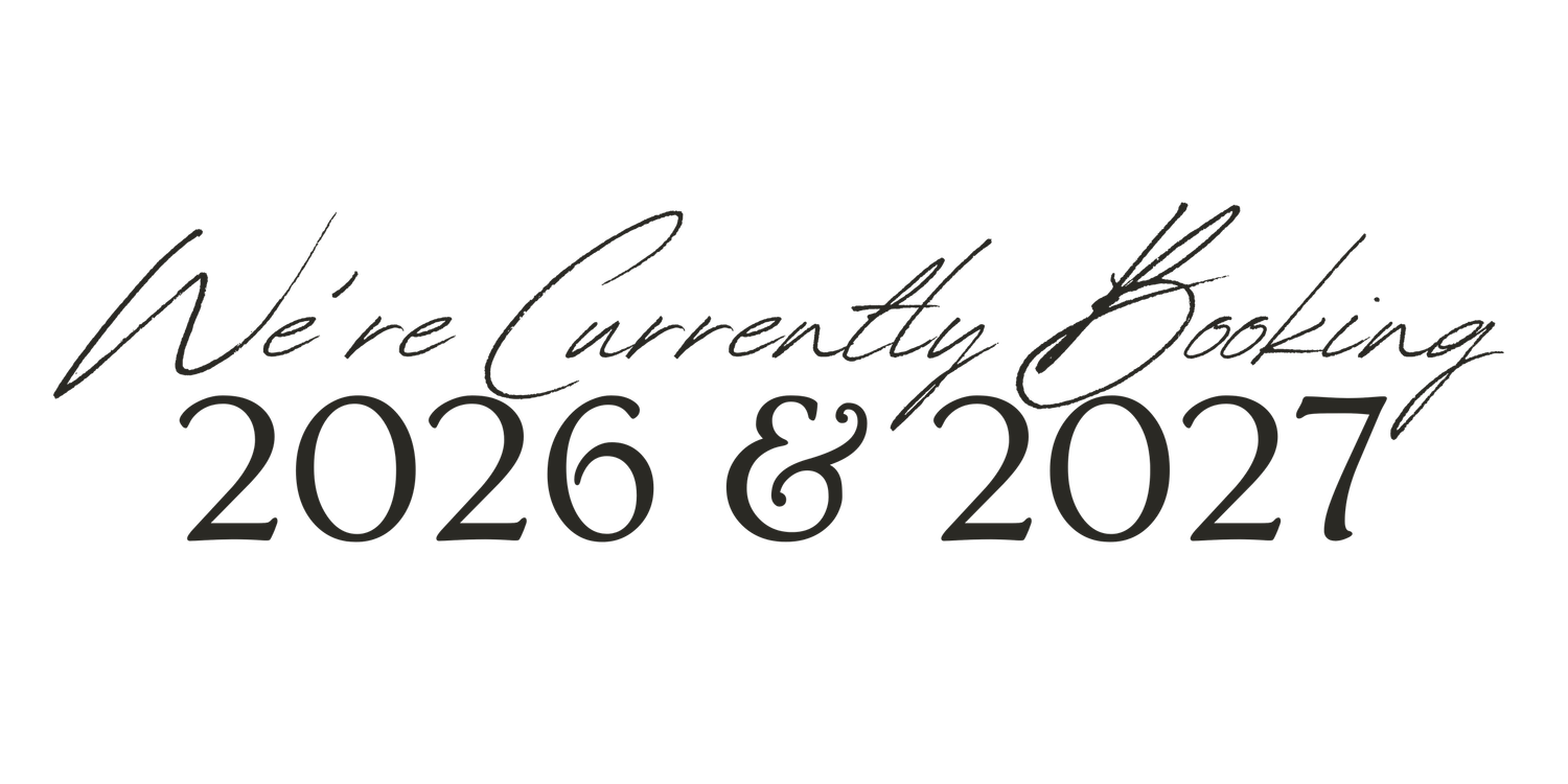 Elegant script and serif text reading We're Currently Booking 2026 and 2027 on a white background.