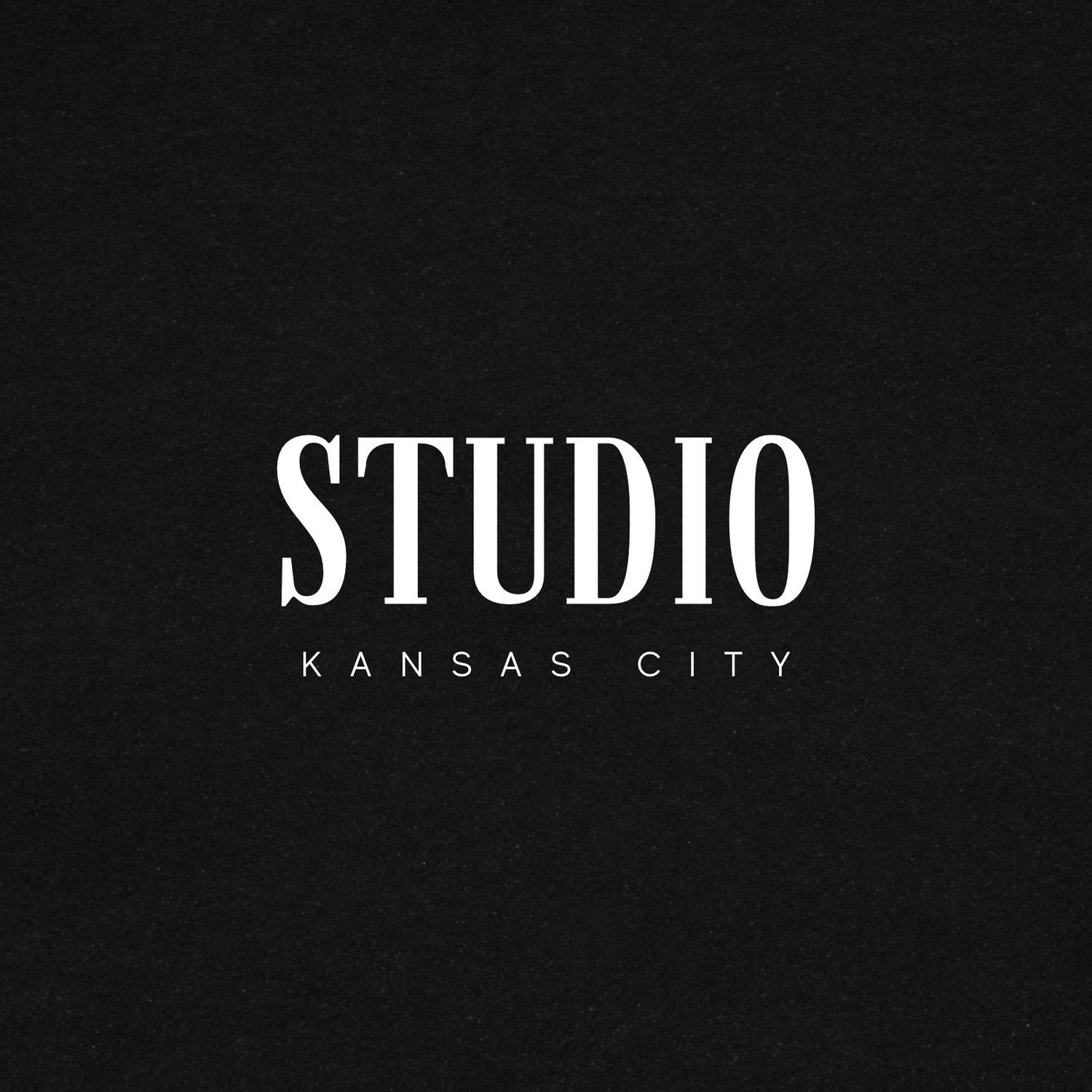 Black and white logo design for Studio Kansas City with elegant typography on dark background.