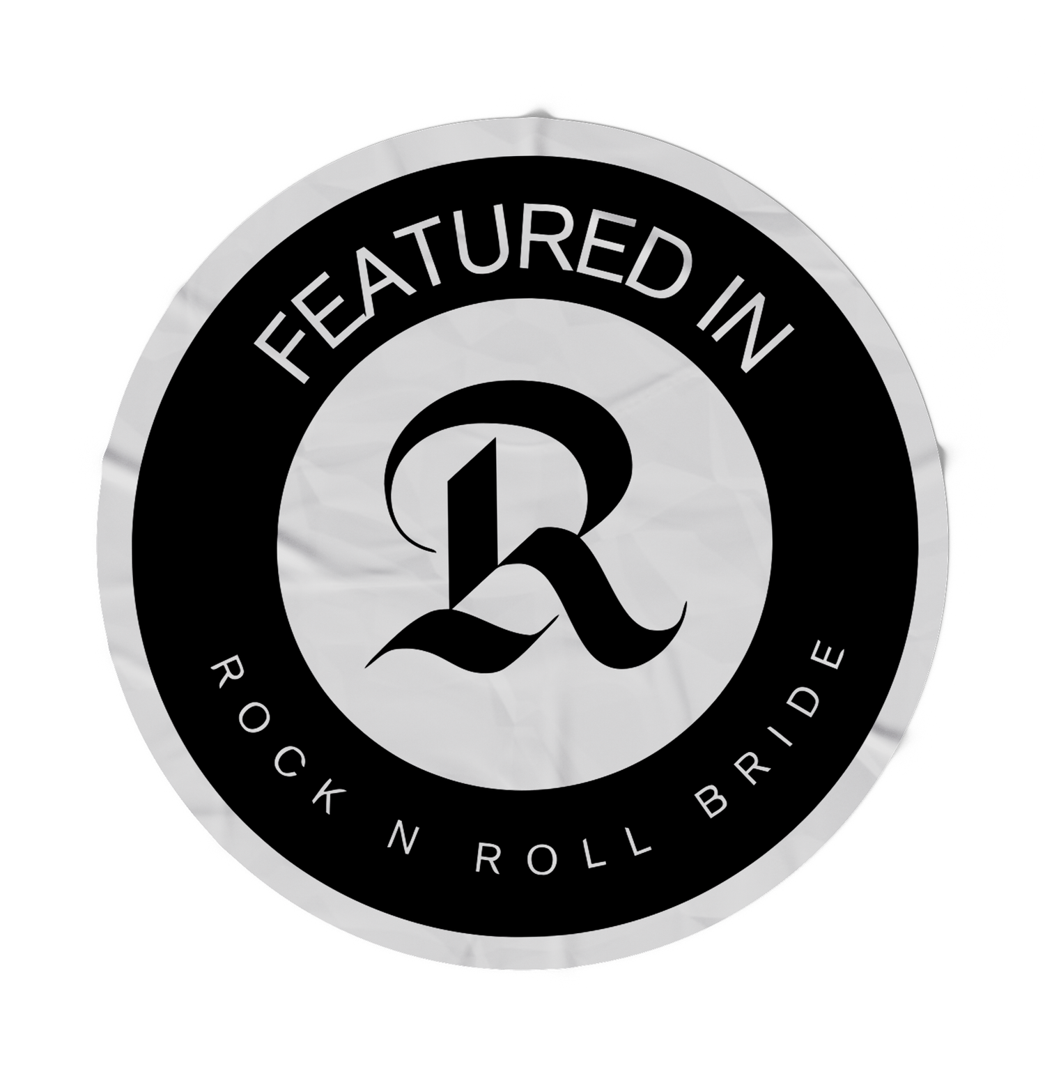 Featured in Rock N Roll Bride circular black and white badge logo on white background.