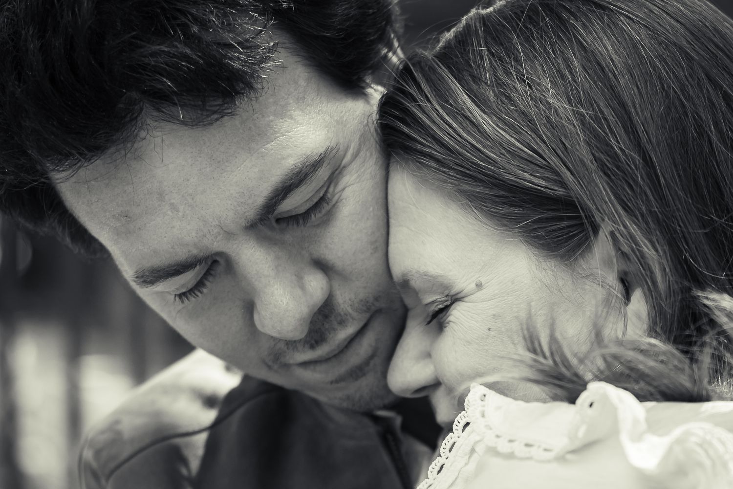 Close-up intimate portrait in black and white.