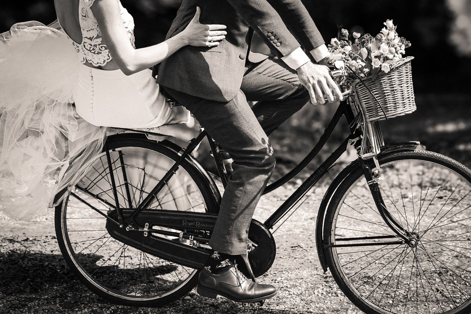 Black and white photo series of romantic bicycle moments between a couple.