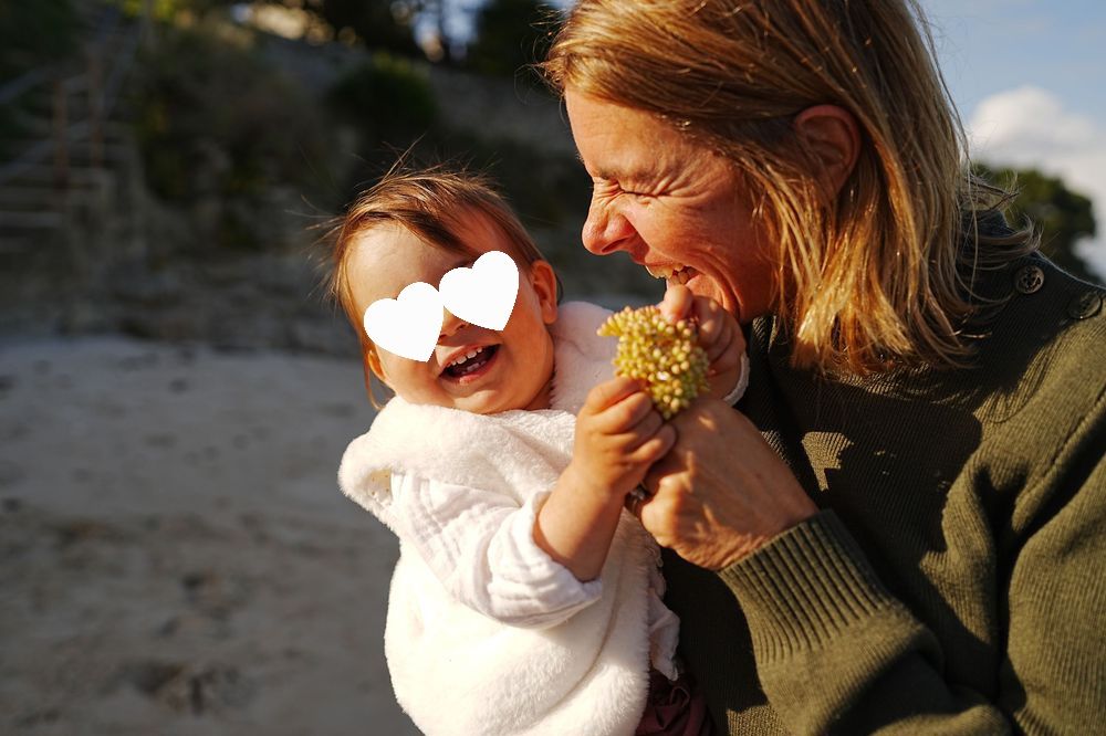 A series of candid outdoor photos showing joyful moments between a parent and young child in natural sunlight.