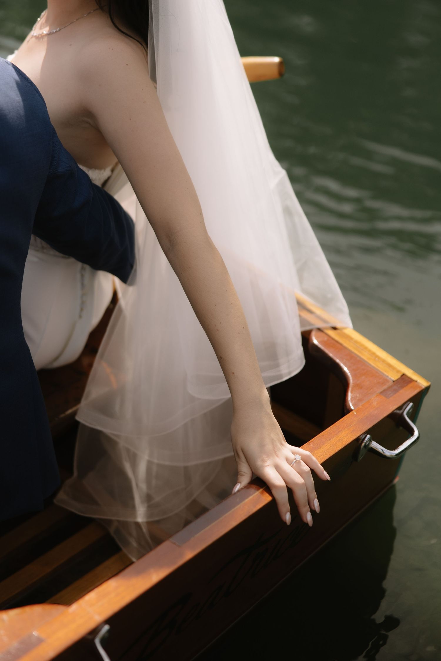 wedding couple in boat on wedding day