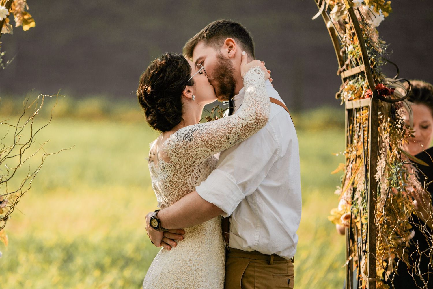 bride and groom after saying i do and first kiss