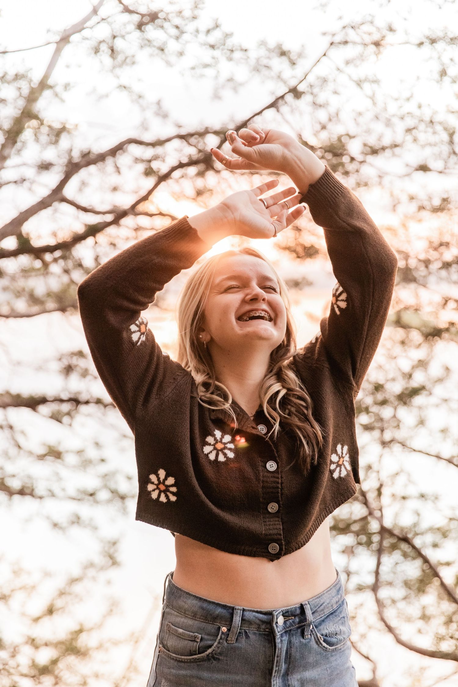 two rivers high school senior girl smiling and laughing during sunset