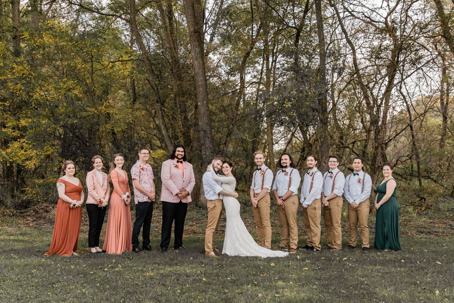 bride and groom with their wedding party