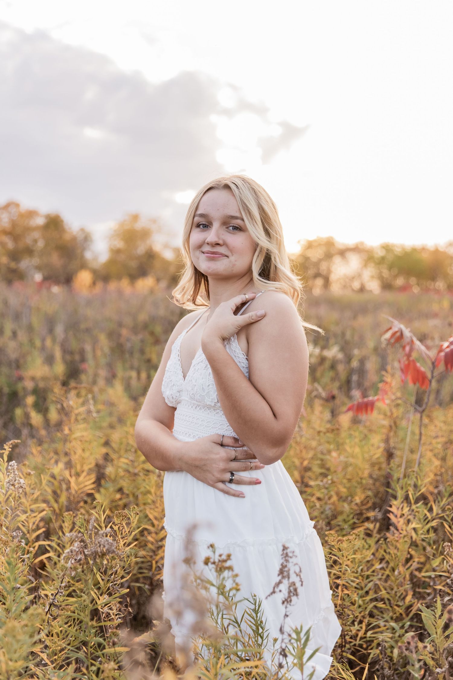 two rivers high school senior girl in a wild flower meadow