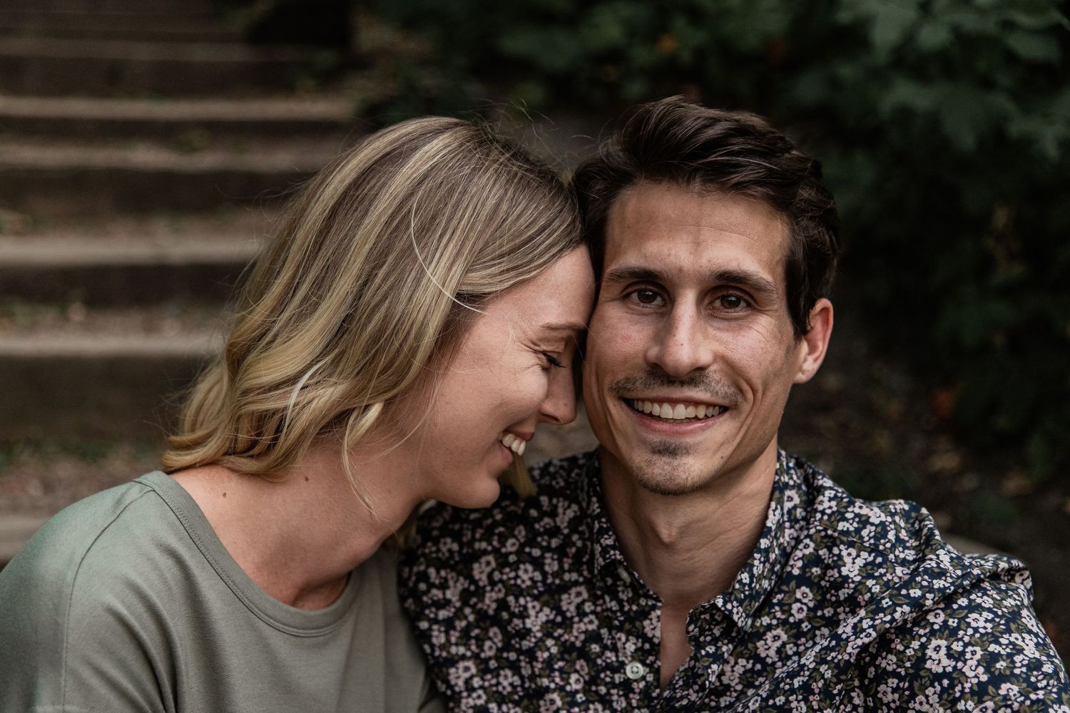 beautiful young blonde woman cozies up to her boyfriend