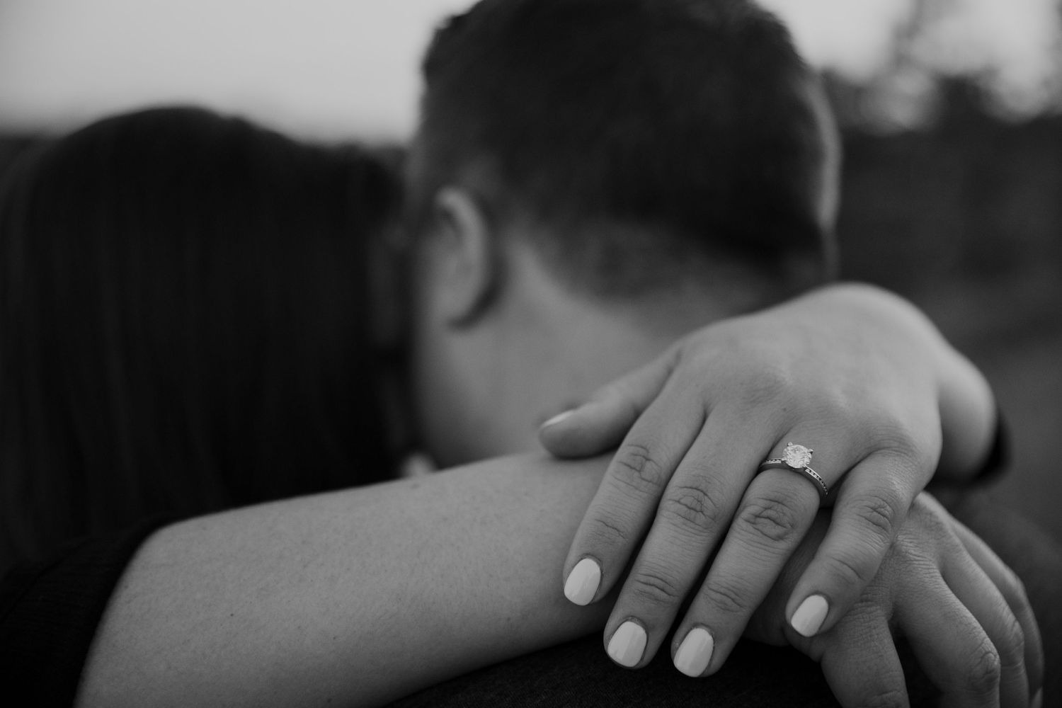 couple shows off gorgeous engagement ring