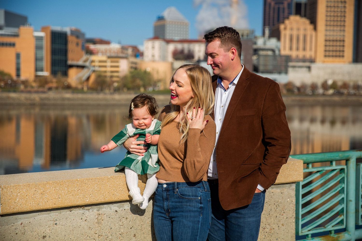 young family with infant daughter downtown waterfront