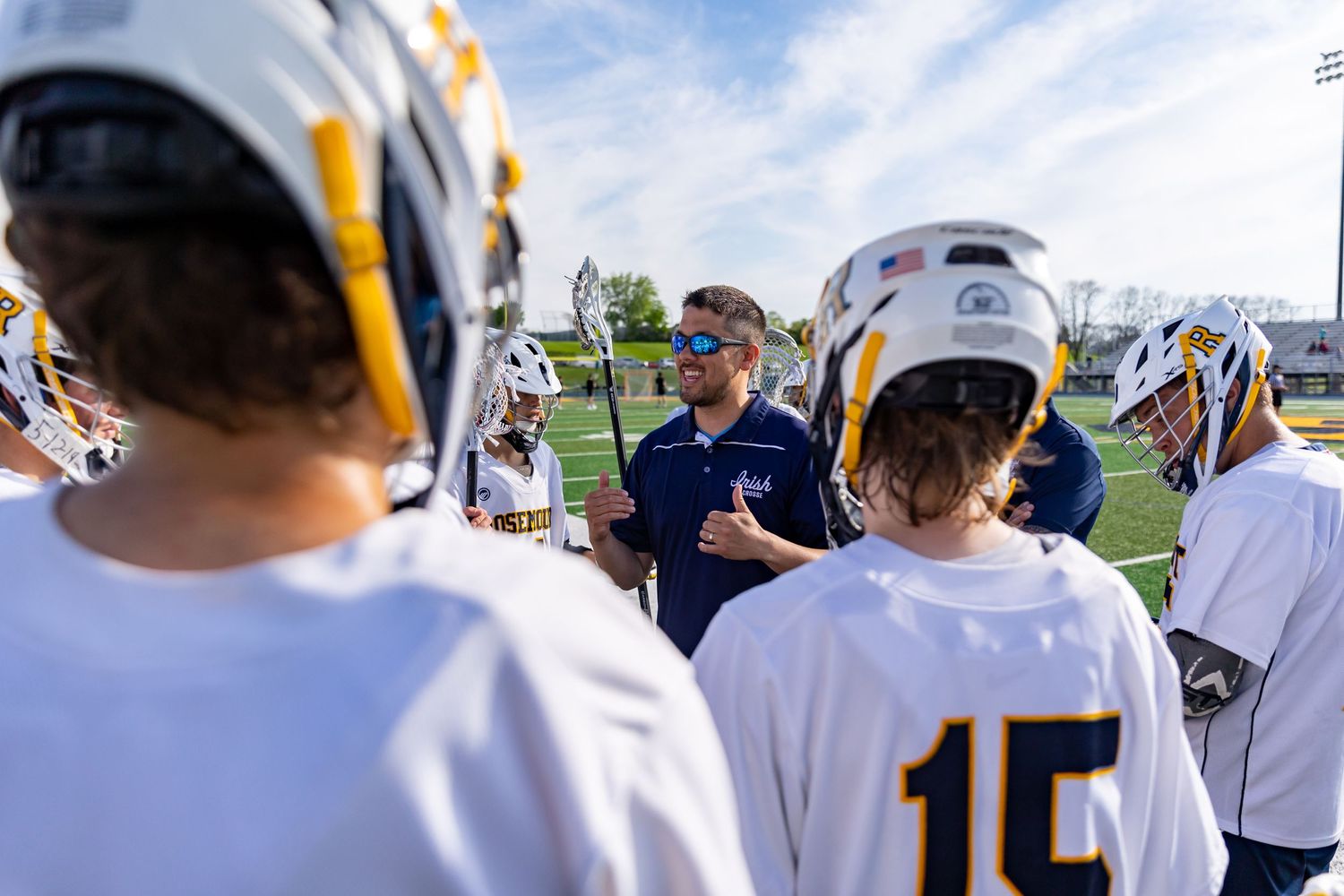 Rosemount Irish lacrosse coach hypes up his players
