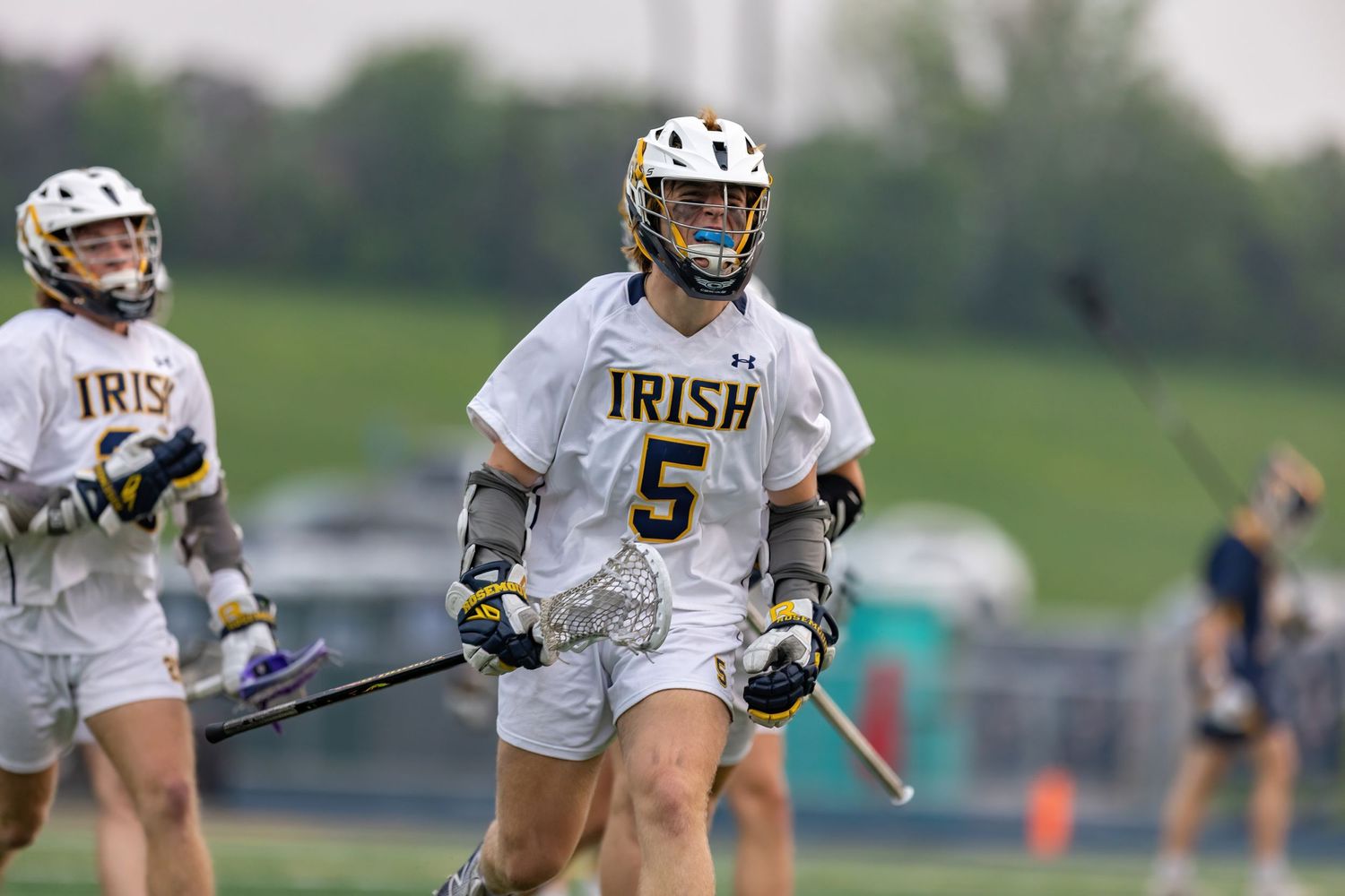 rosemount irish boys lacrosse midfielder celebrates after scoring big goal