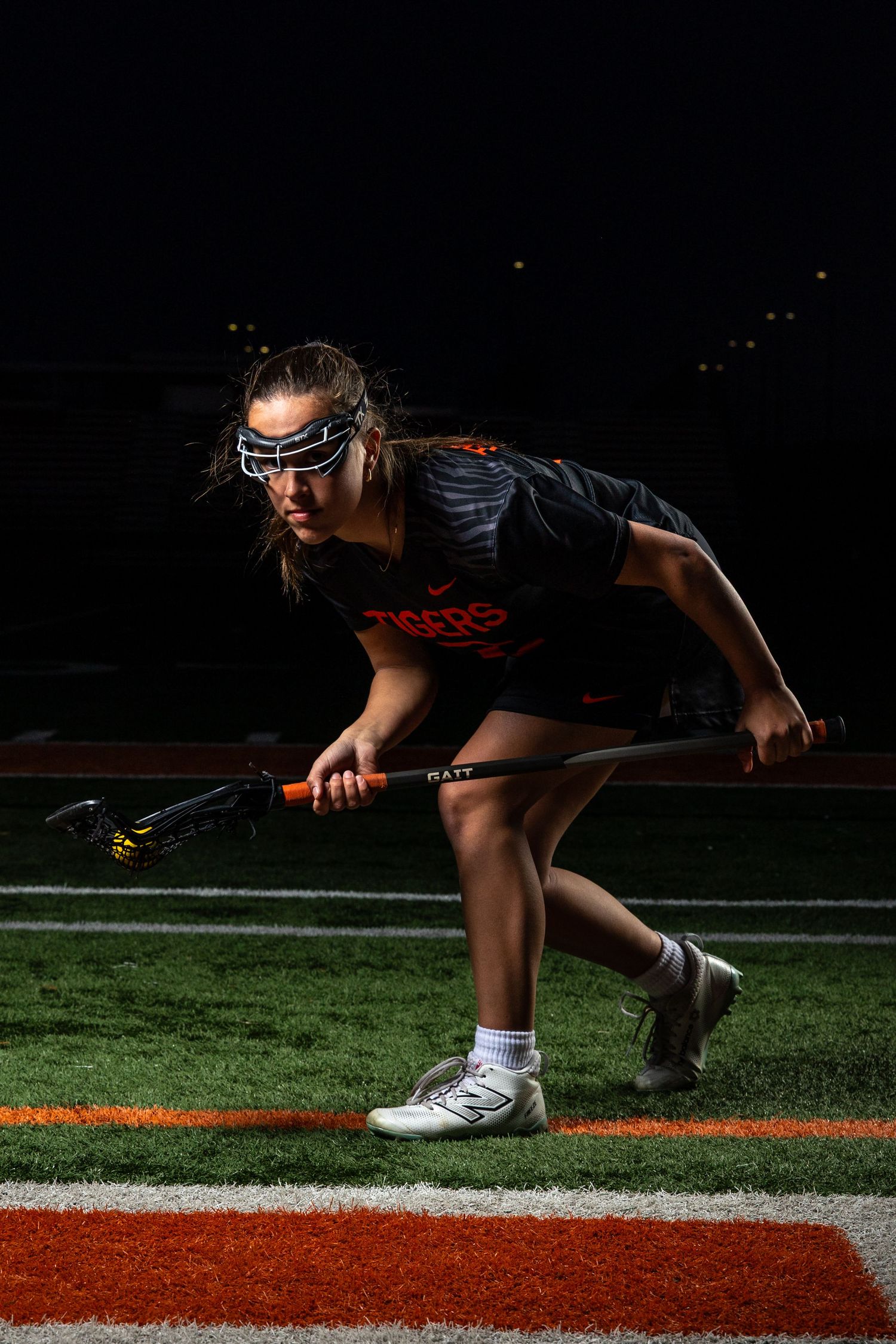 Farmington Tigers girls lacrosse player gives her best attacking game face pose for media day