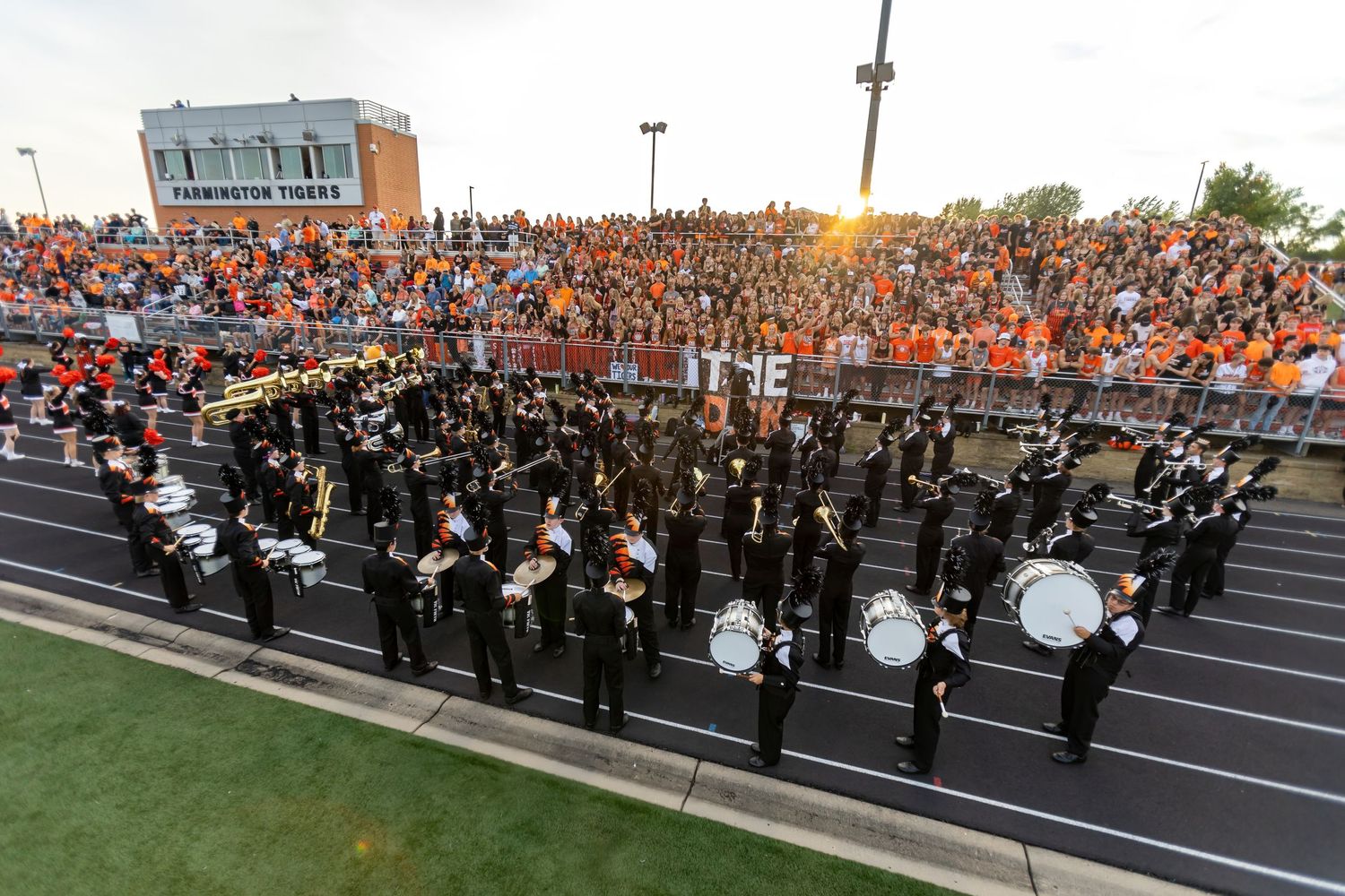Farmington High School Tigers homecoming football game crowded stands football stadium