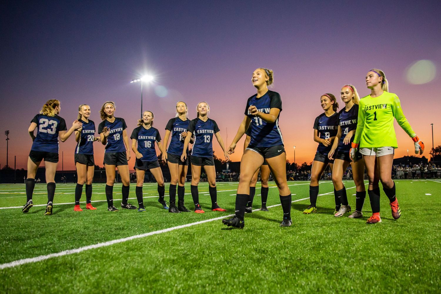 eastview high school girls soccer all smiles as they prepare for the game