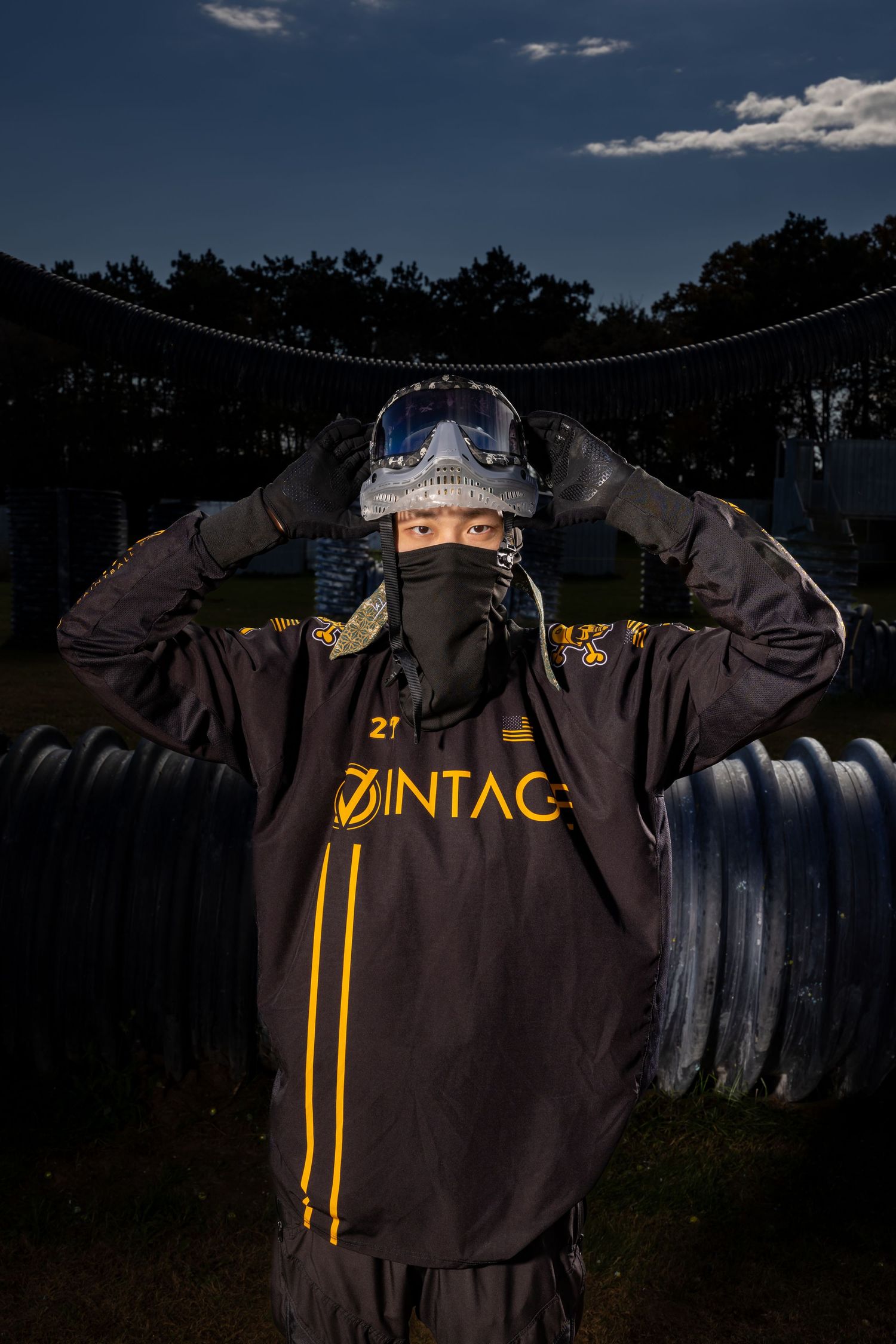 Havoc paintball team player pulls up his mask
