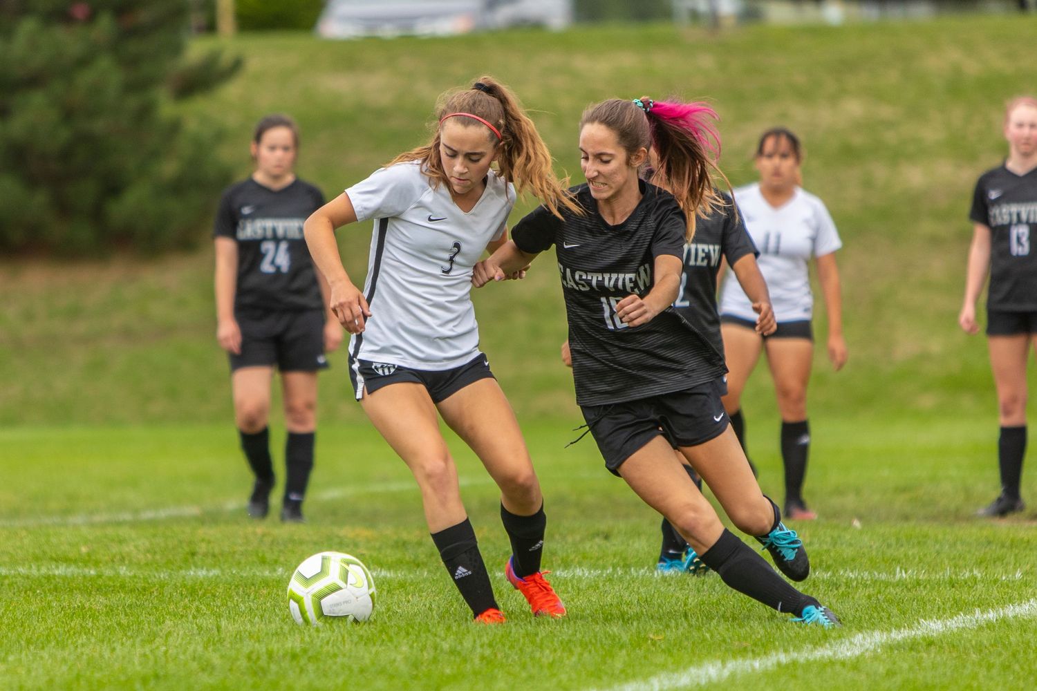 eastview high school girls soccer player shoving to get attacker off the ball