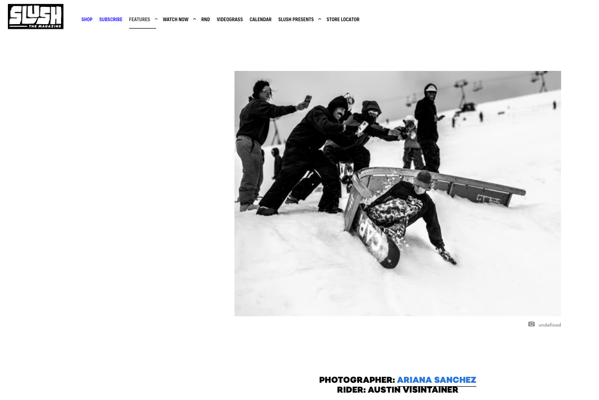 Black and white photo of winter sports enthusiasts playing in the snow at a ski resort.
