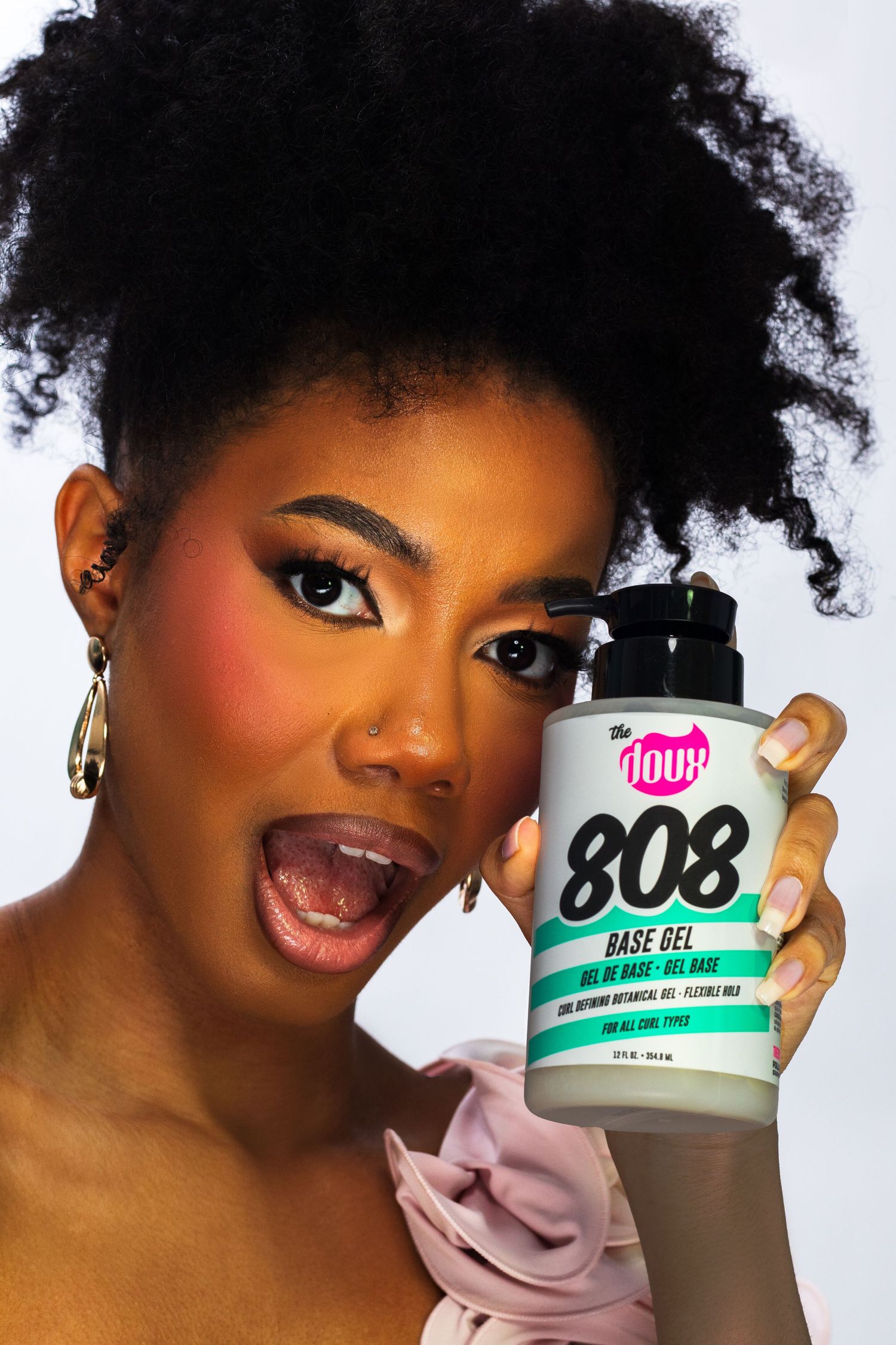 Model showcasing The Doux 808 Base Gel with open-mouth expression.