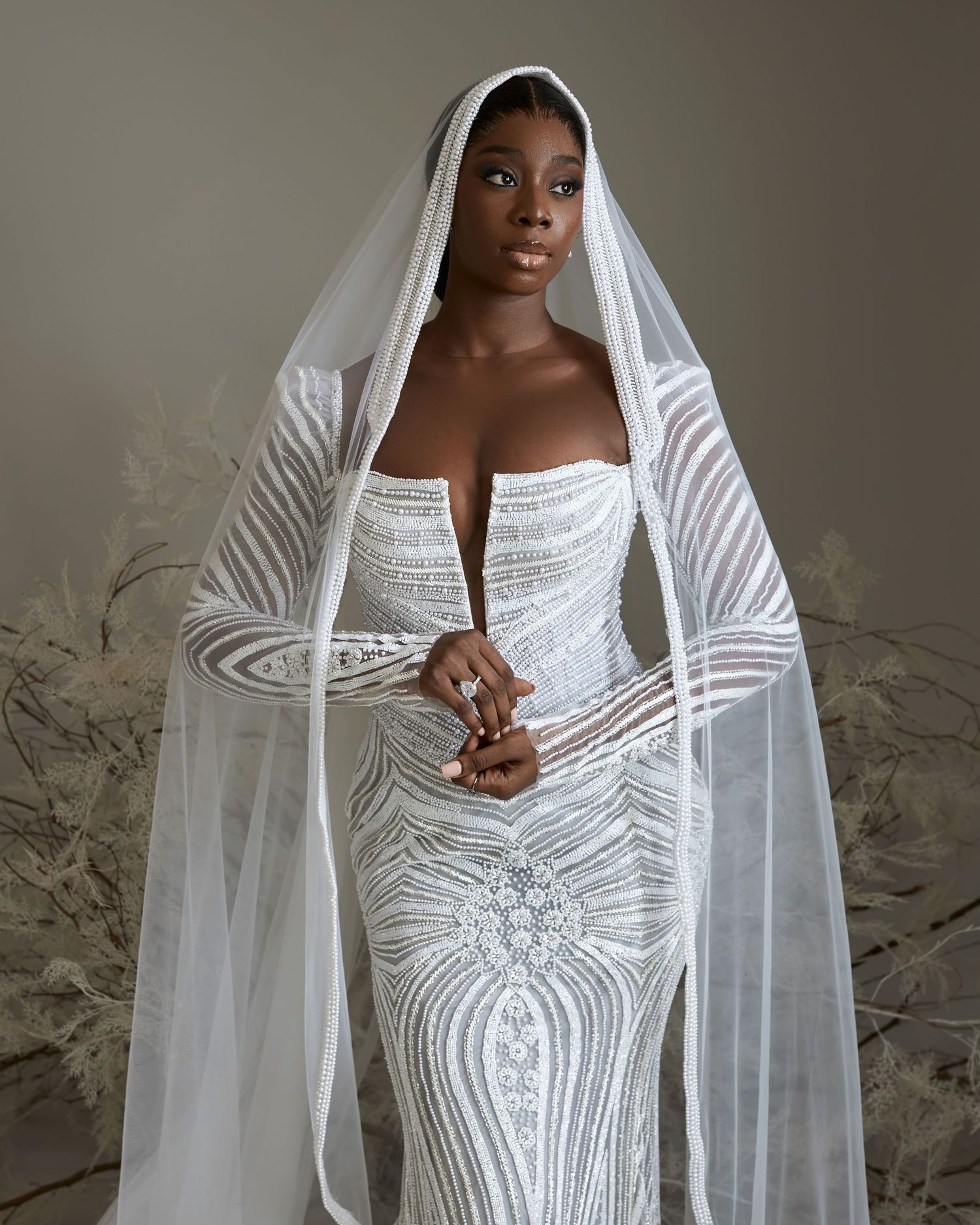 fire weddding dress by EMAGINEBYBUKOLA – elegant fashion photography by The Loba, a creative photographer in Lagos, Nigeria. Model: tovia_o