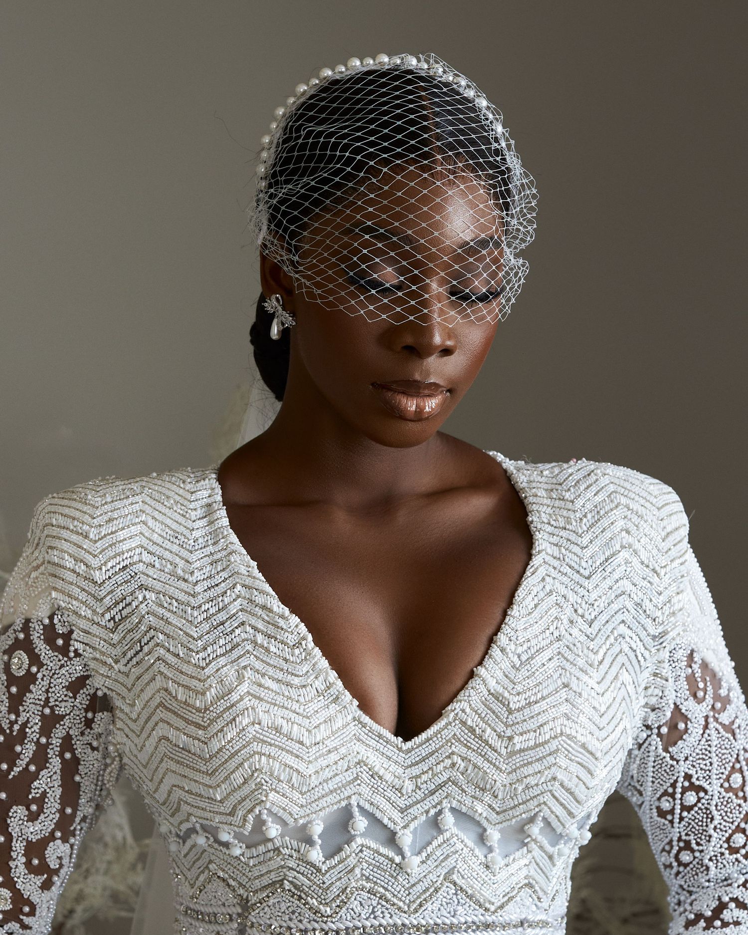 fire weddding dress by EMAGINEBYBUKOLA – elegant fashion photography by The Loba, a creative photographer in Lagos, Nigeria. Model: tovia_o