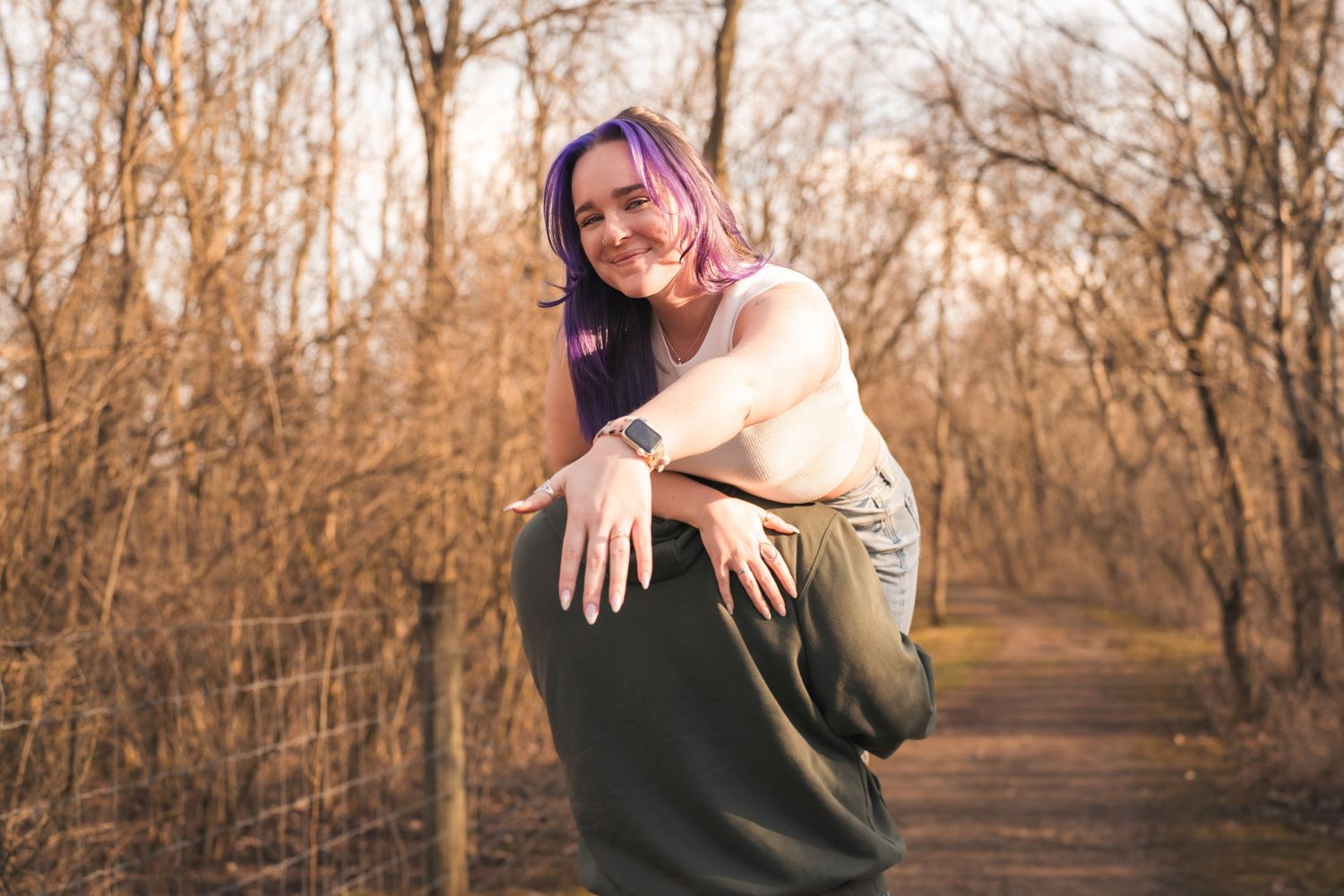 Candid moments captured on a nature trail during golden hour.