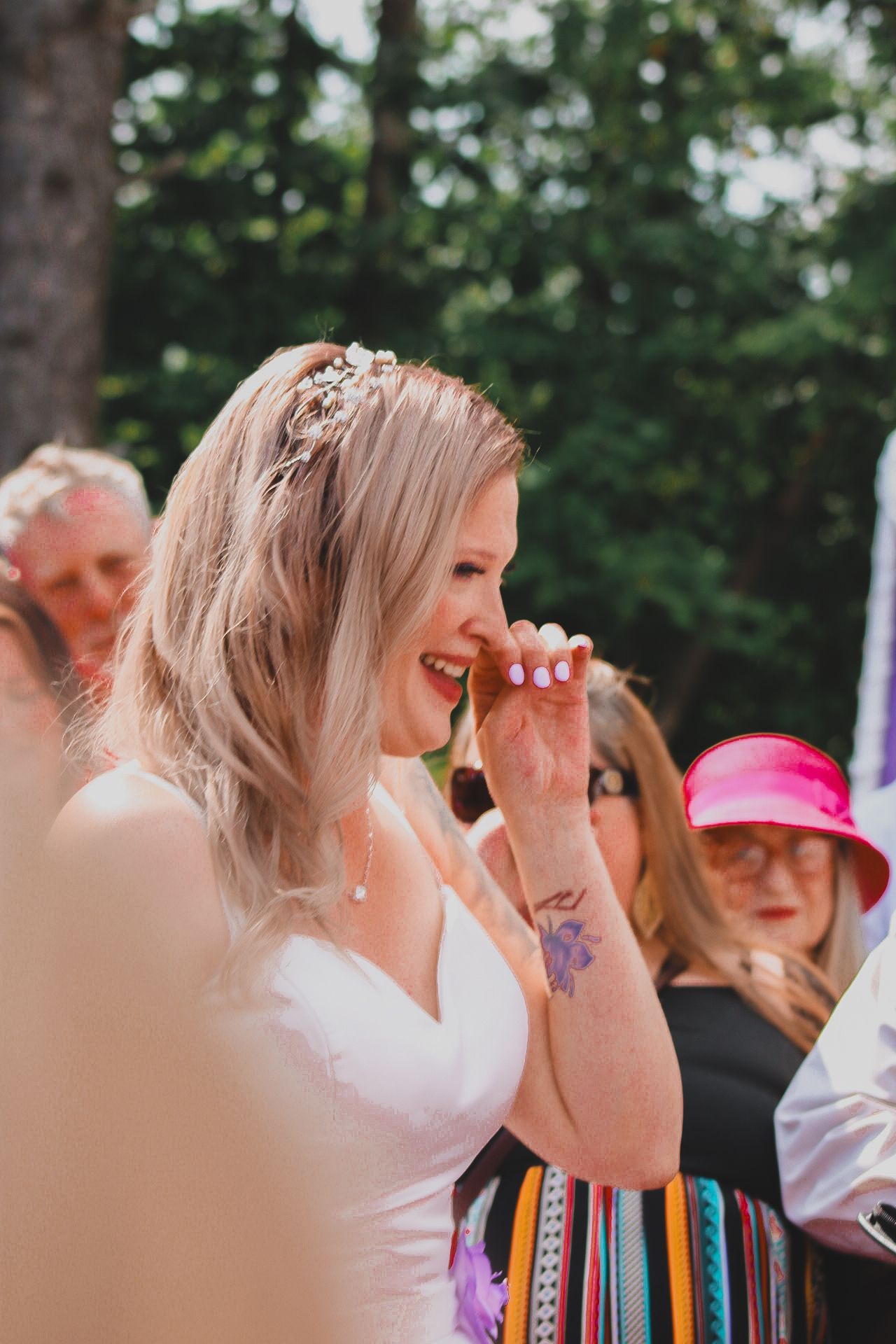 A sequence of five photos showing the progression of an emotional reaction at an outdoor event.