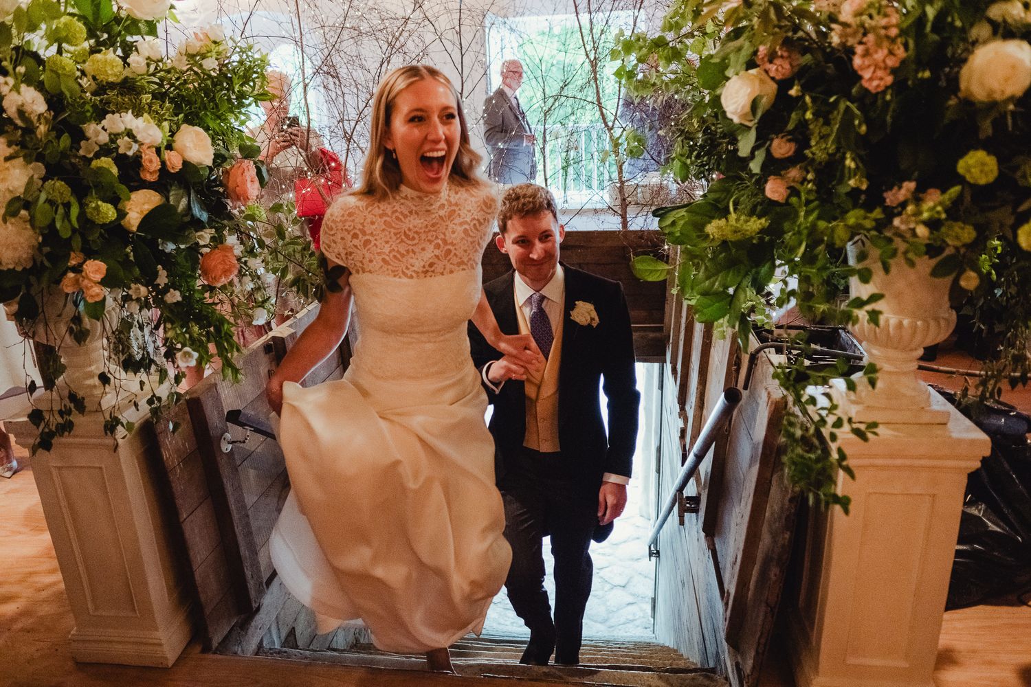 A series of wedding photography moments showing ceremony and reception activities in an elegant venue with floral decor.