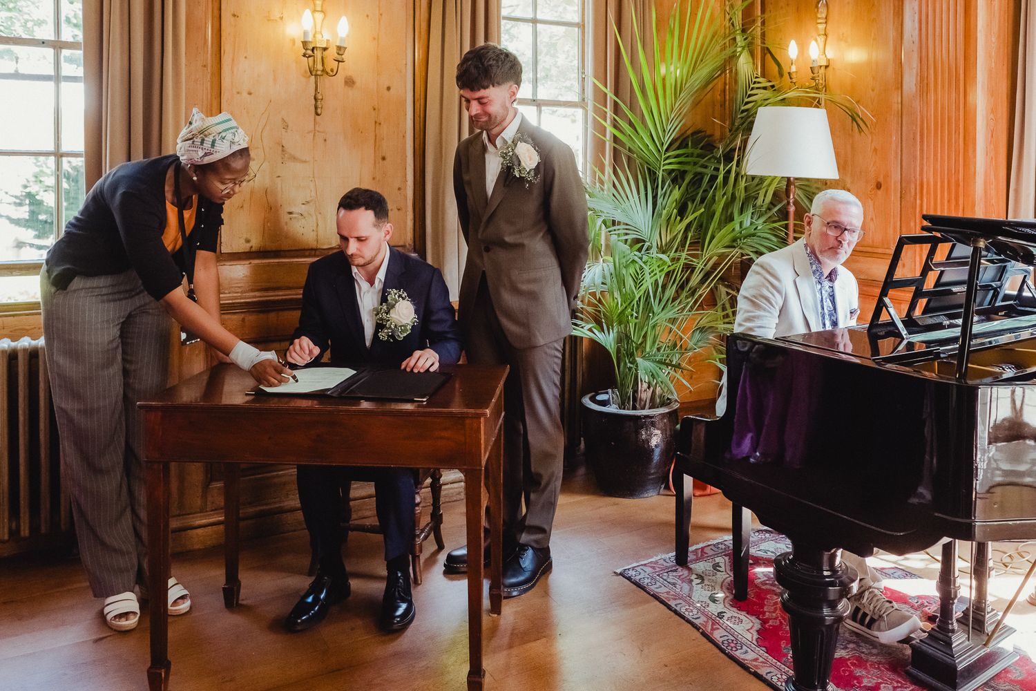 A series of candid wedding photos showing tender moments between couples in an elegant indoor venue with warm lighting.