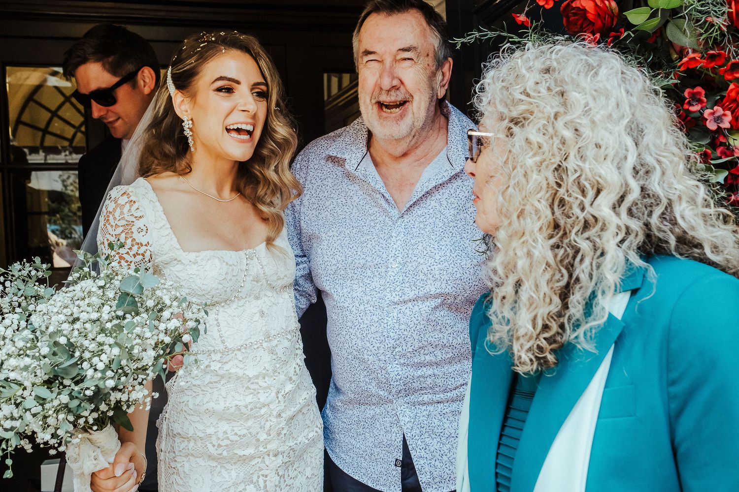 A series of candid wedding photos showing joyful moments between the couple and their guests at an indoor celebration.