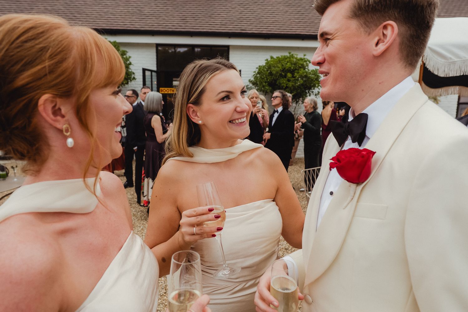 A series of candid wedding photos showing romantic moments between the newlyweds during their celebration.