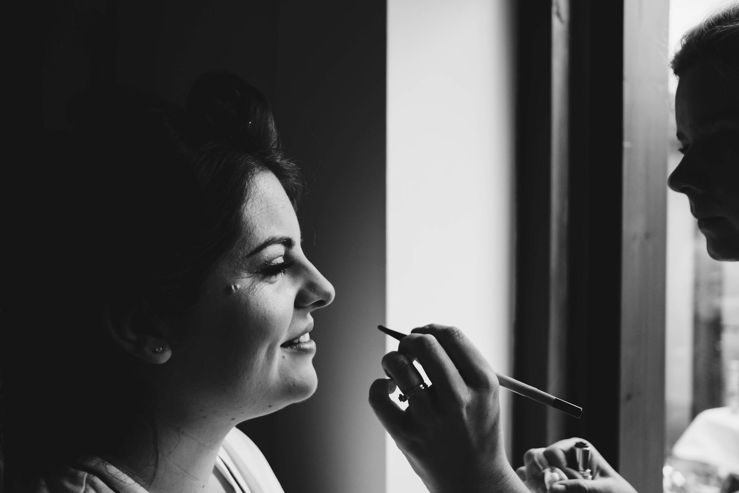 Black and white photo showing preparation of getting ready for a special occasion.