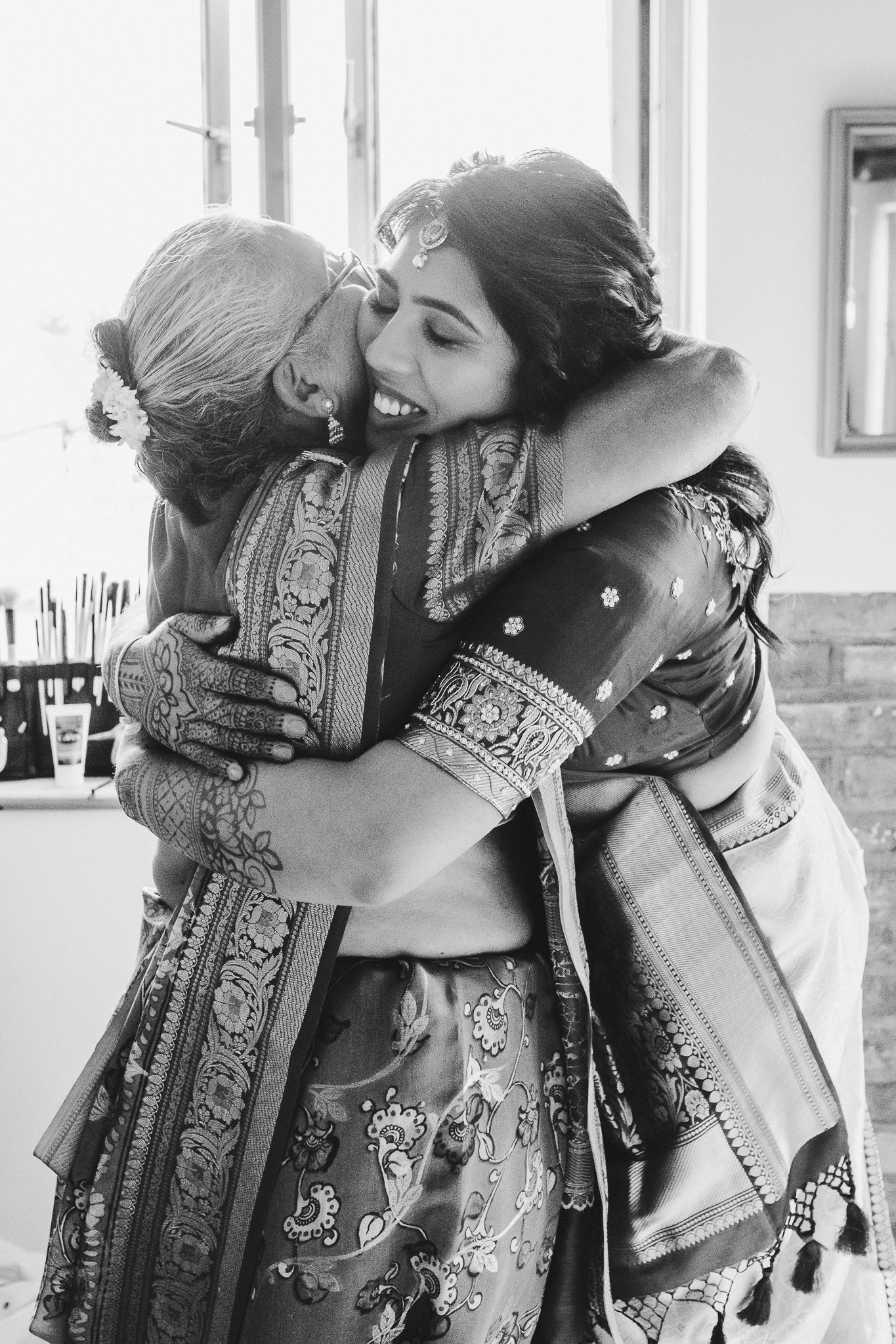Black and white series of traditional bandana-style headpieces being worn.