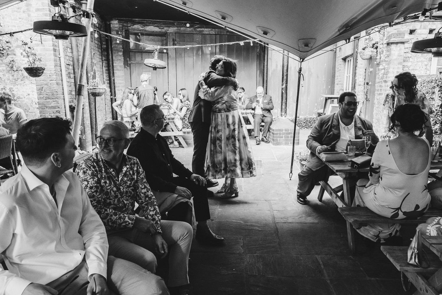 Monochrome photo series showing daily life and commuters on public transit in an urban environment.