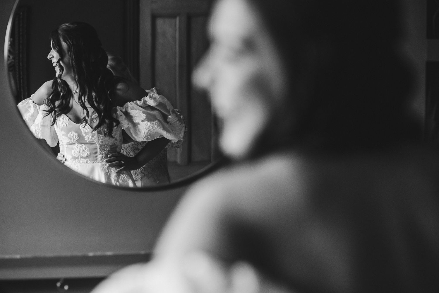 Black and white wedding photography captures intimate moments during the ceremony and reception.