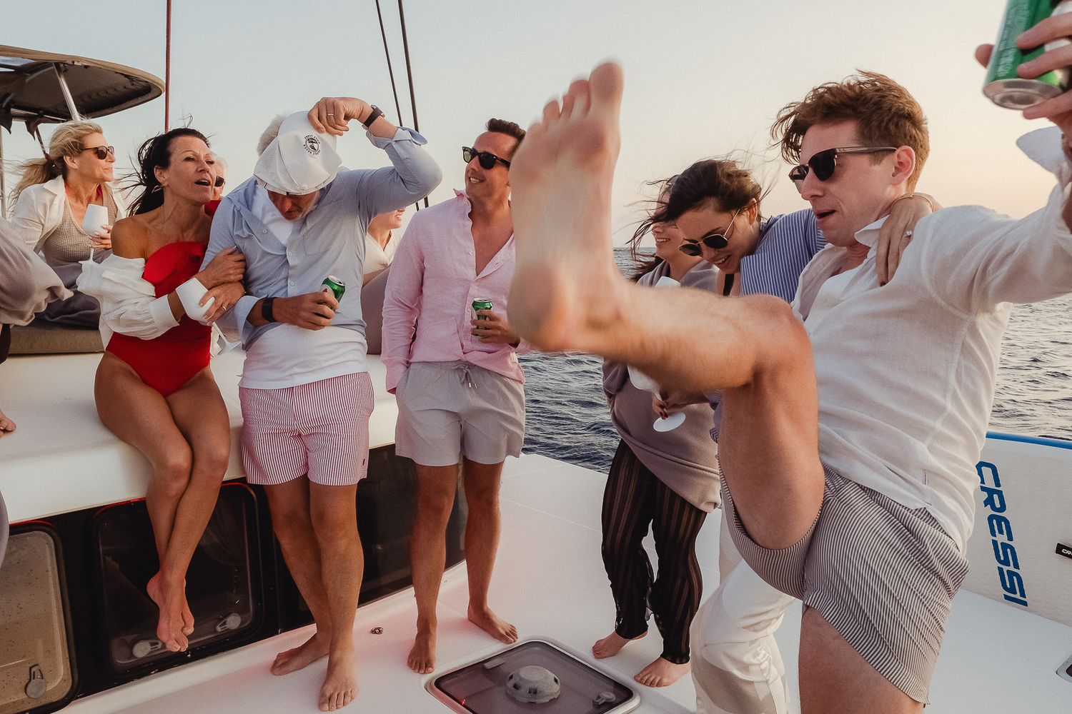 A collage of party guests dancing and celebrating at what appears to be a festive summer gathering.